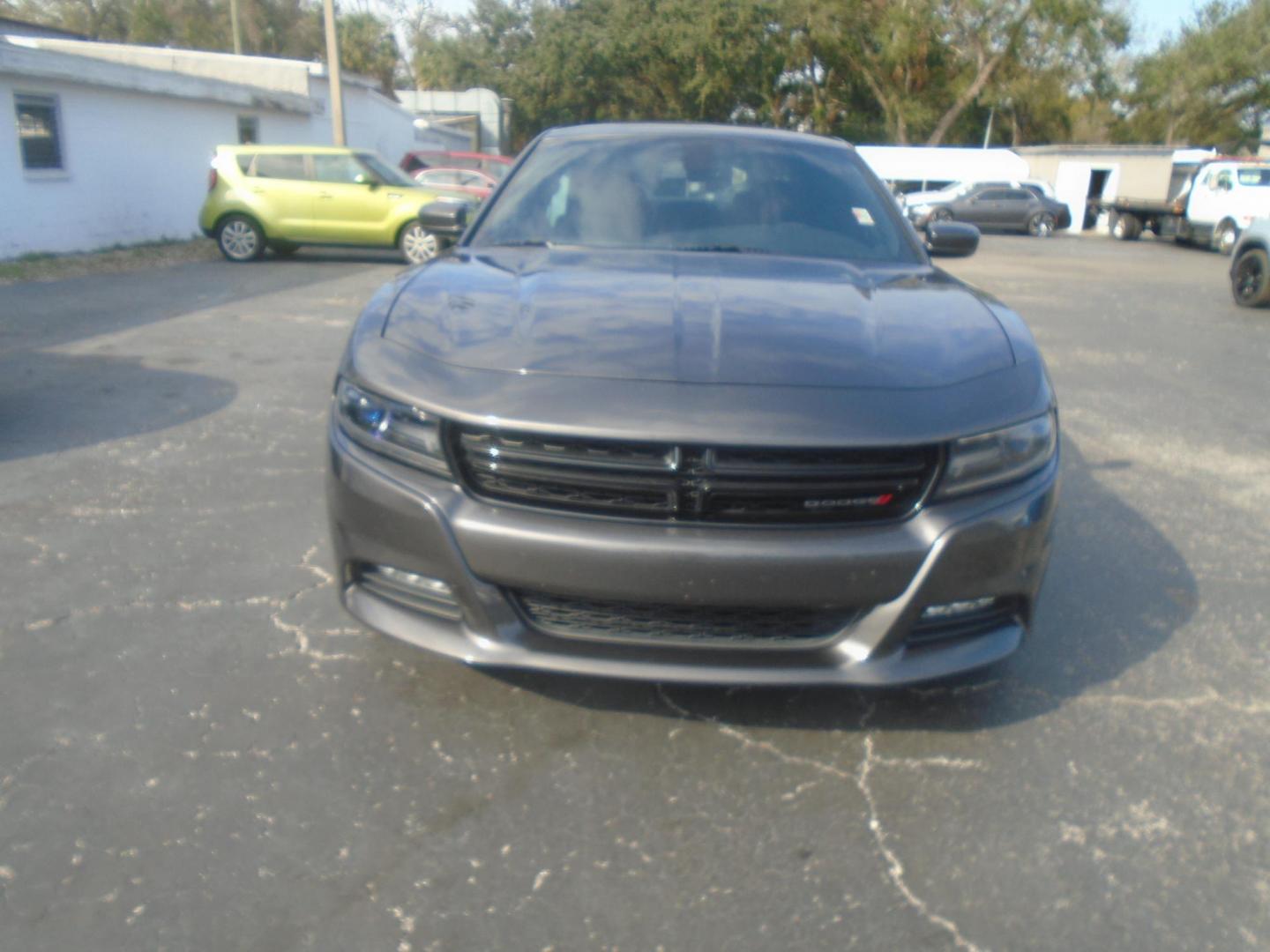 2018 Dodge Charger SXT (2C3CDXHG5JH) with an 3.6L V6 DOHC 24V engine, 8A transmission, located at 6112 N Florida Avenue, Tampa, FL, 33604, (888) 521-5131, 27.954929, -82.459534 - Photo#1