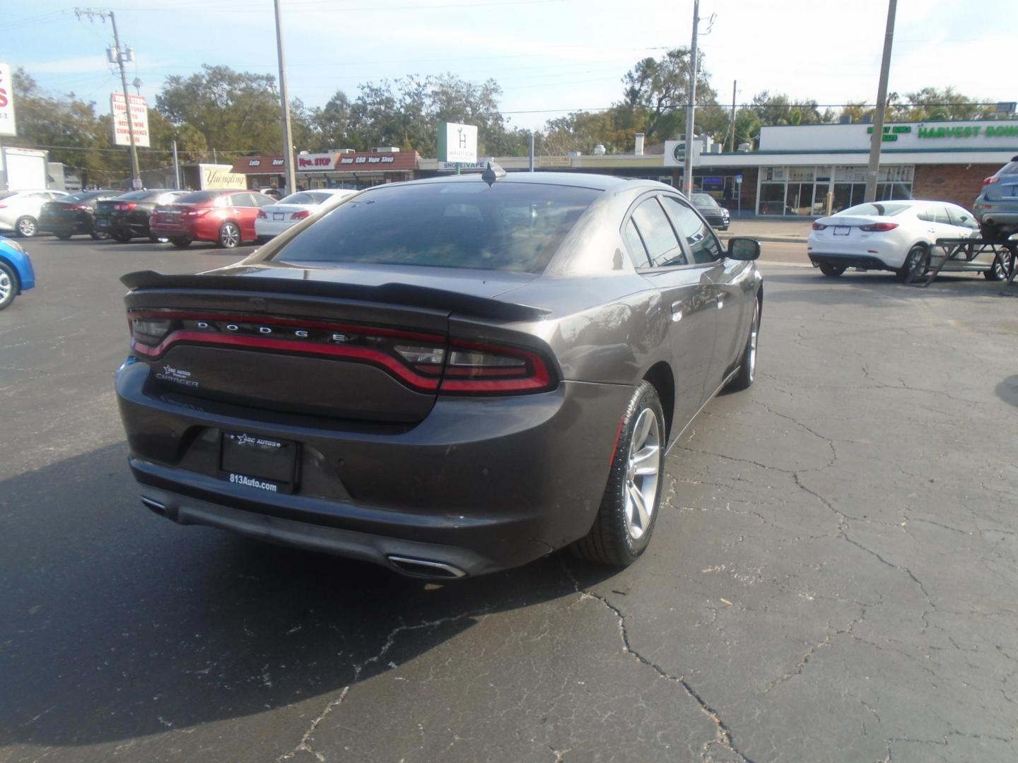 2018 Dodge Charger SXT (2C3CDXHG5JH) with an 3.6L V6 DOHC 24V engine, 8A transmission, located at 6112 N Florida Avenue, Tampa, FL, 33604, (888) 521-5131, 27.954929, -82.459534 - Photo#5