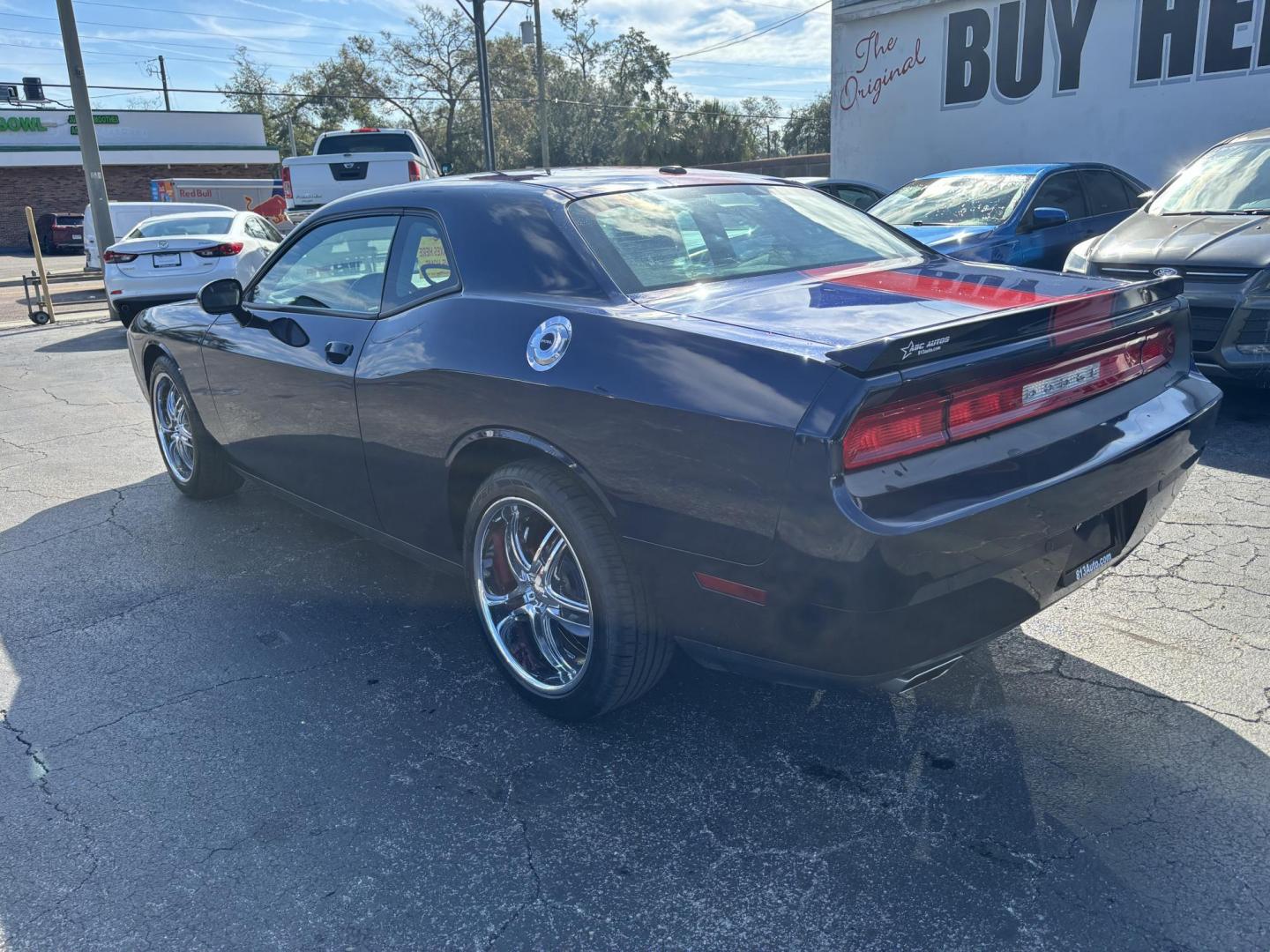 2013 Dodge Challenger SXT (2C3CDYAG5DH) with an 3.6L V6 DOHC 24V engine, 4-Speed Automatic transmission, located at 6112 N Florida Avenue, Tampa, FL, 33604, (888) 521-5131, 27.954929, -82.459534 - Photo#4