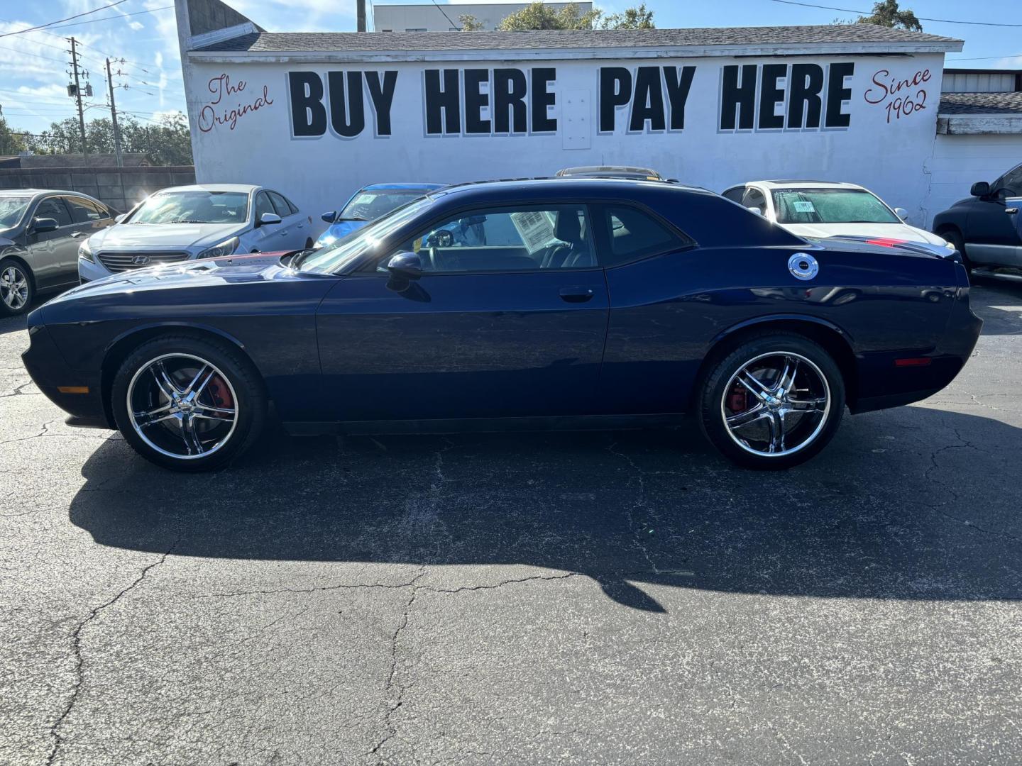 2013 Dodge Challenger SXT (2C3CDYAG5DH) with an 3.6L V6 DOHC 24V engine, 4-Speed Automatic transmission, located at 6112 N Florida Avenue, Tampa, FL, 33604, (888) 521-5131, 27.954929, -82.459534 - Photo#0