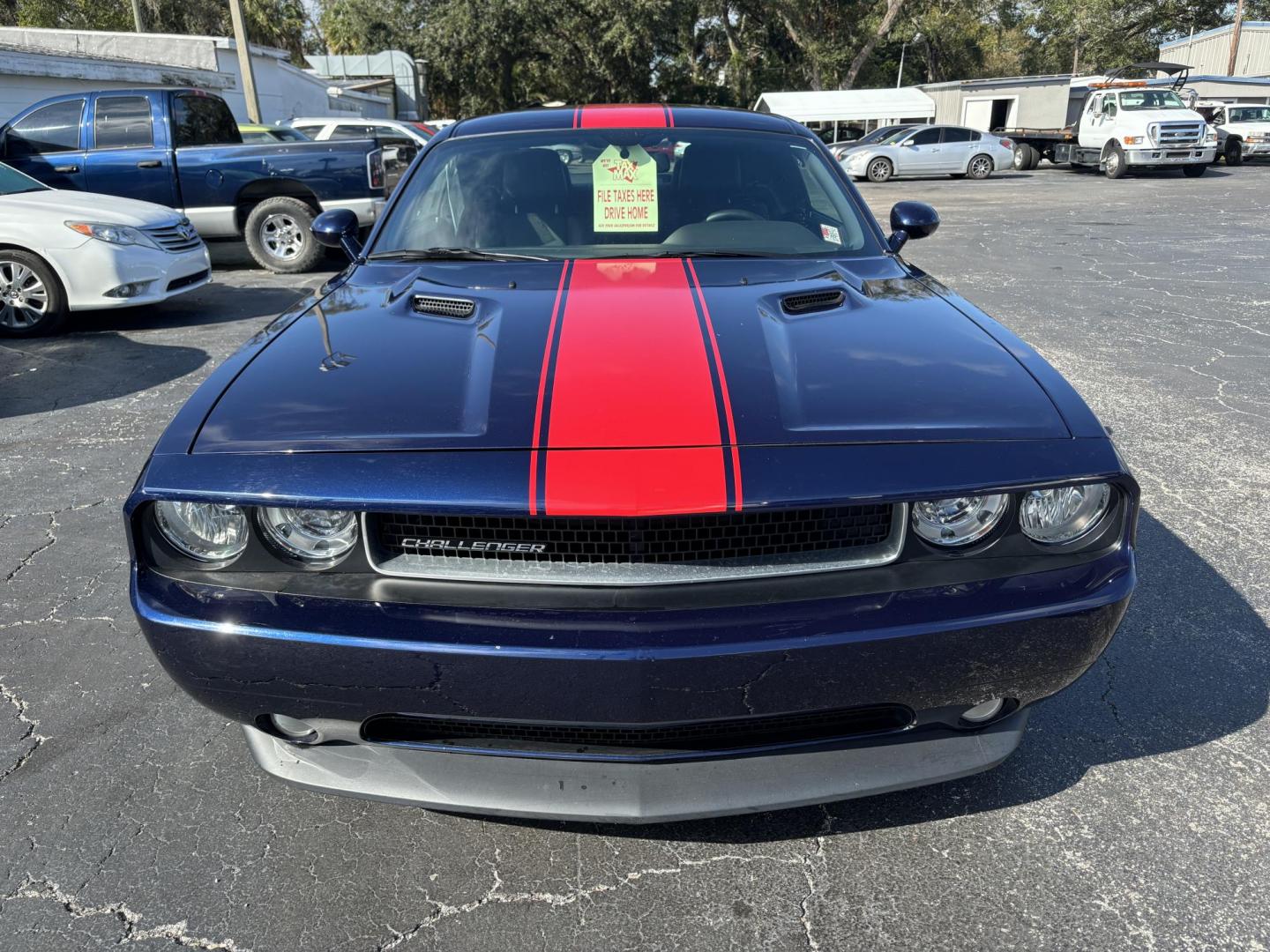 2013 Dodge Challenger SXT (2C3CDYAG5DH) with an 3.6L V6 DOHC 24V engine, 4-Speed Automatic transmission, located at 6112 N Florida Avenue, Tampa, FL, 33604, (888) 521-5131, 27.954929, -82.459534 - Photo#1