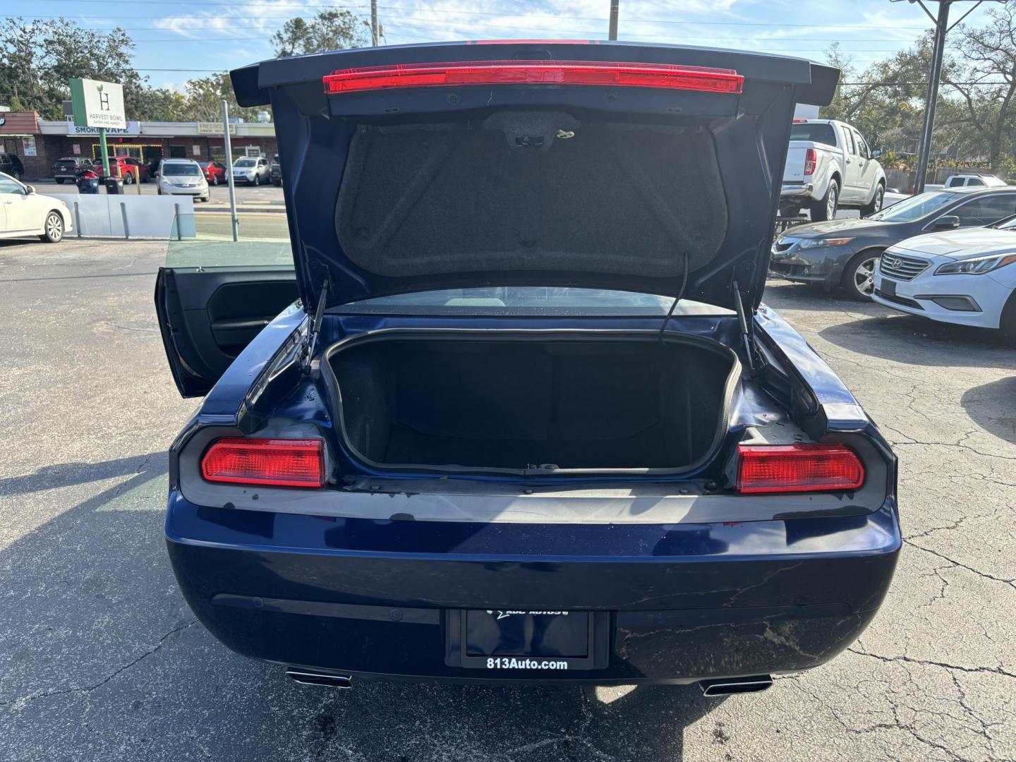 2013 Dodge Challenger SXT (2C3CDYAG5DH) with an 3.6L V6 DOHC 24V engine, 4-Speed Automatic transmission, located at 6112 N Florida Avenue, Tampa, FL, 33604, (888) 521-5131, 27.954929, -82.459534 - Photo#6