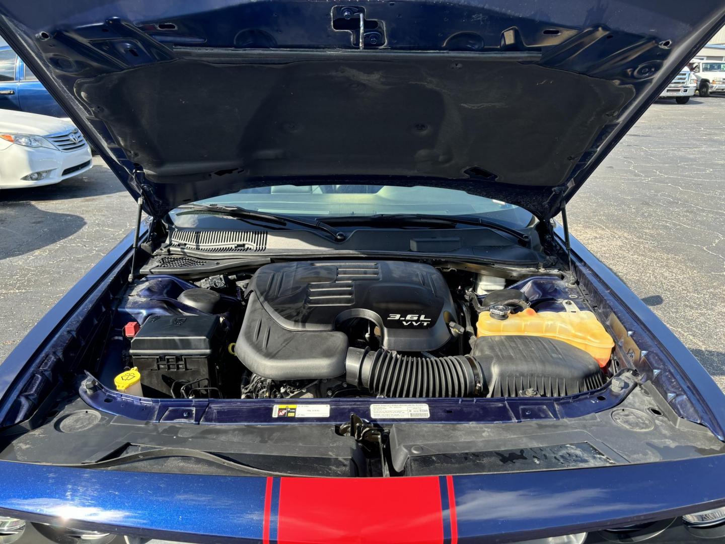 2013 Dodge Challenger SXT (2C3CDYAG5DH) with an 3.6L V6 DOHC 24V engine, 4-Speed Automatic transmission, located at 6112 N Florida Avenue, Tampa, FL, 33604, (888) 521-5131, 27.954929, -82.459534 - Photo#7