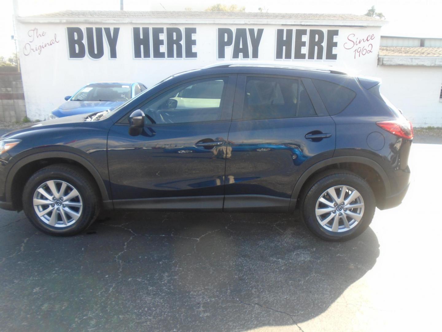 2016 Mazda CX-5 Touring (JM3KE2CYXG0) with an 2.5L L4 DOHC 16V engine, 6-Speed Automatic transmission, located at 6112 N Florida Avenue, Tampa, FL, 33604, (888) 521-5131, 27.954929, -82.459534 - Photo#0