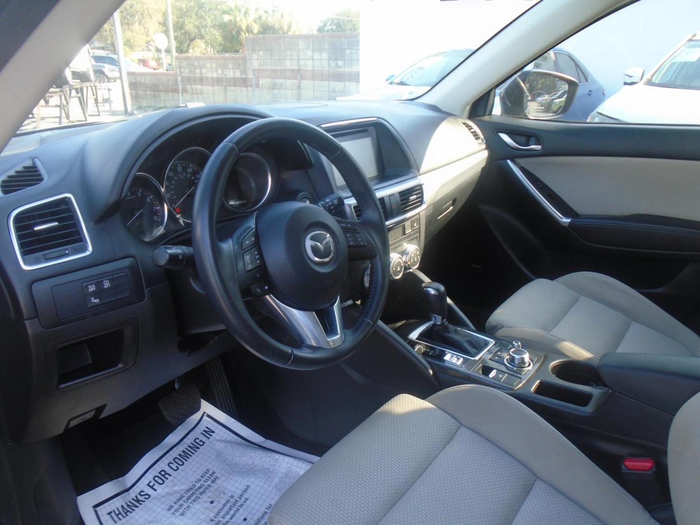 2016 Mazda CX-5 Touring (JM3KE2CYXG0) with an 2.5L L4 DOHC 16V engine, 6-Speed Automatic transmission, located at 6112 N Florida Avenue, Tampa, FL, 33604, (888) 521-5131, 27.954929, -82.459534 - Photo#9