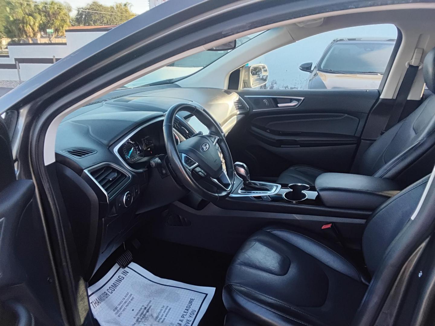 2018 GRAY /Black Ford Edge Titanium (2FMPK3K98JB) with an 2.0L L4 DOHC 16V engine, 6A transmission, located at 6112 N Florida Avenue, Tampa, FL, 33604, (888) 521-5131, 27.954929, -82.459534 - $499 down plus tax & tag. - Photo#8