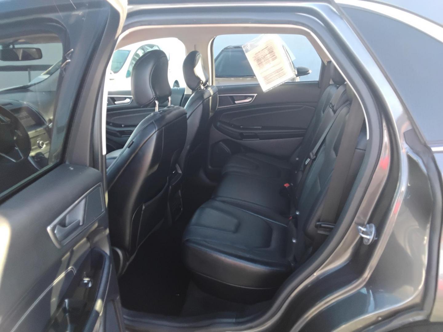 2018 GRAY /Black Ford Edge Titanium (2FMPK3K98JB) with an 2.0L L4 DOHC 16V engine, 6A transmission, located at 6112 N Florida Avenue, Tampa, FL, 33604, (888) 521-5131, 27.954929, -82.459534 - $499 down plus tax & tag. - Photo#9