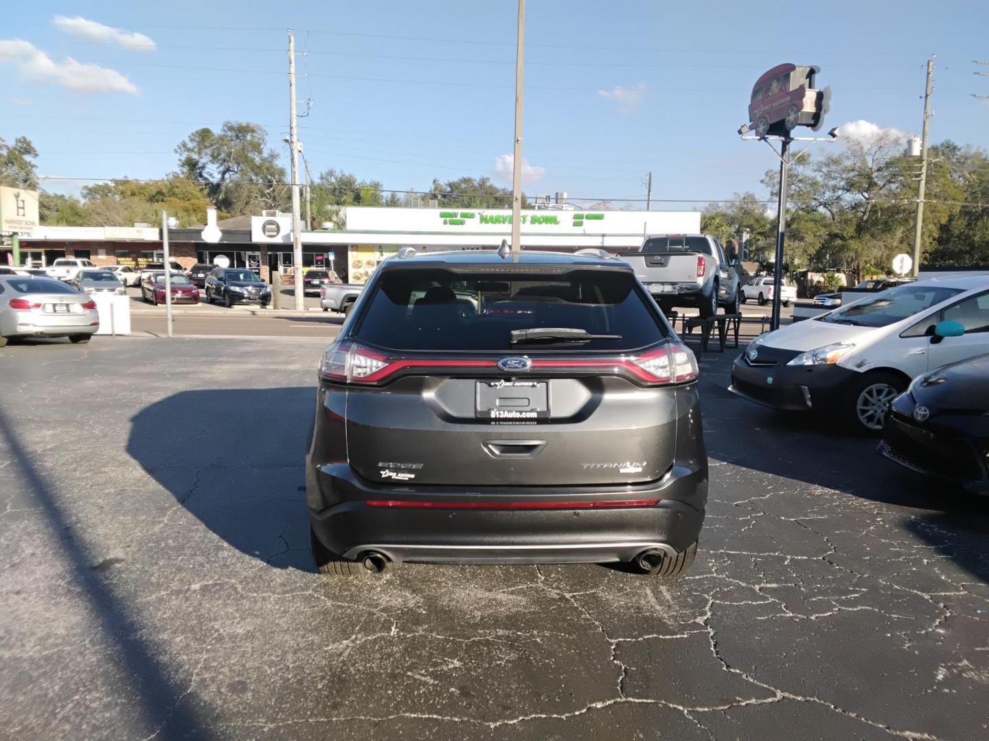 2018 GRAY /Black Ford Edge Titanium (2FMPK3K98JB) with an 2.0L L4 DOHC 16V engine, 6A transmission, located at 6112 N Florida Avenue, Tampa, FL, 33604, (888) 521-5131, 27.954929, -82.459534 - $499 down plus tax & tag. - Photo#5