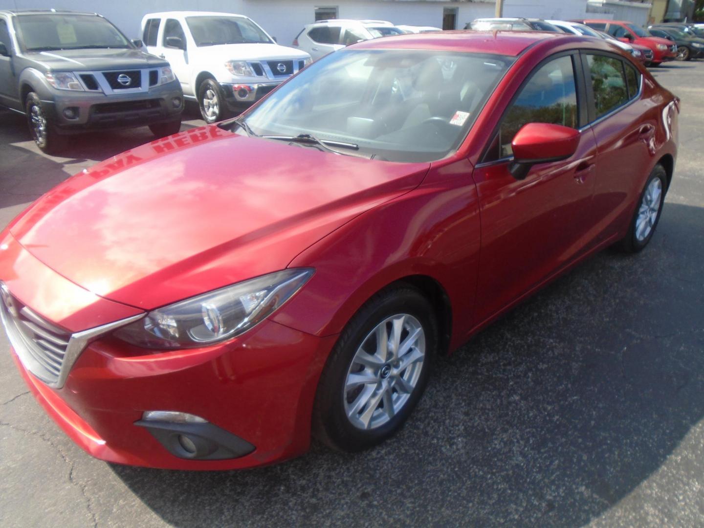 2015 Mazda MAZDA3 i Touring AT 4-Door (3MZBM1V74FM) with an 2.0L L4 DOHC 16V engine, 6-Speed Automatic transmission, located at 6112 N Florida Avenue, Tampa, FL, 33604, (888) 521-5131, 27.954929, -82.459534 - Photo#2