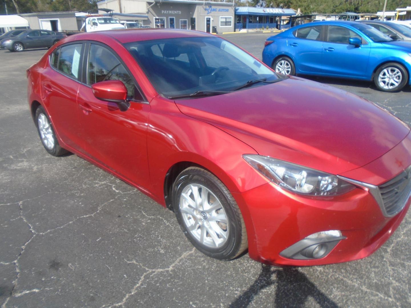 2015 Mazda MAZDA3 i Touring AT 4-Door (3MZBM1V74FM) with an 2.0L L4 DOHC 16V engine, 6-Speed Automatic transmission, located at 6112 N Florida Avenue, Tampa, FL, 33604, (888) 521-5131, 27.954929, -82.459534 - Photo#3