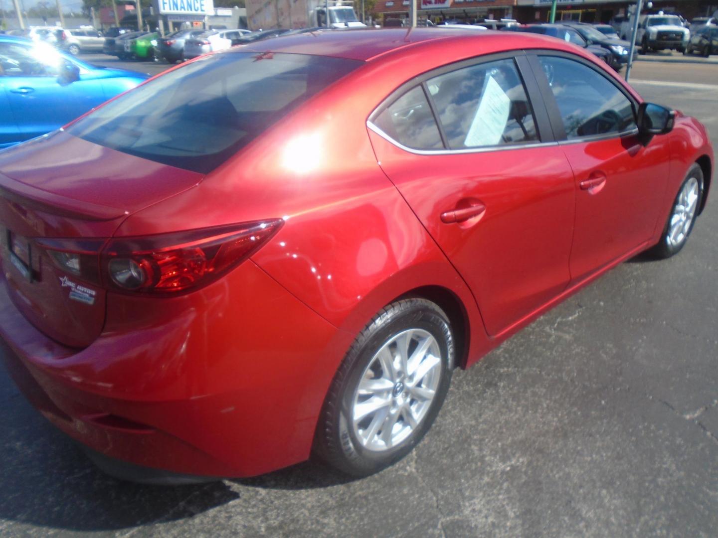 2015 Mazda MAZDA3 i Touring AT 4-Door (3MZBM1V74FM) with an 2.0L L4 DOHC 16V engine, 6-Speed Automatic transmission, located at 6112 N Florida Avenue, Tampa, FL, 33604, (888) 521-5131, 27.954929, -82.459534 - Photo#6