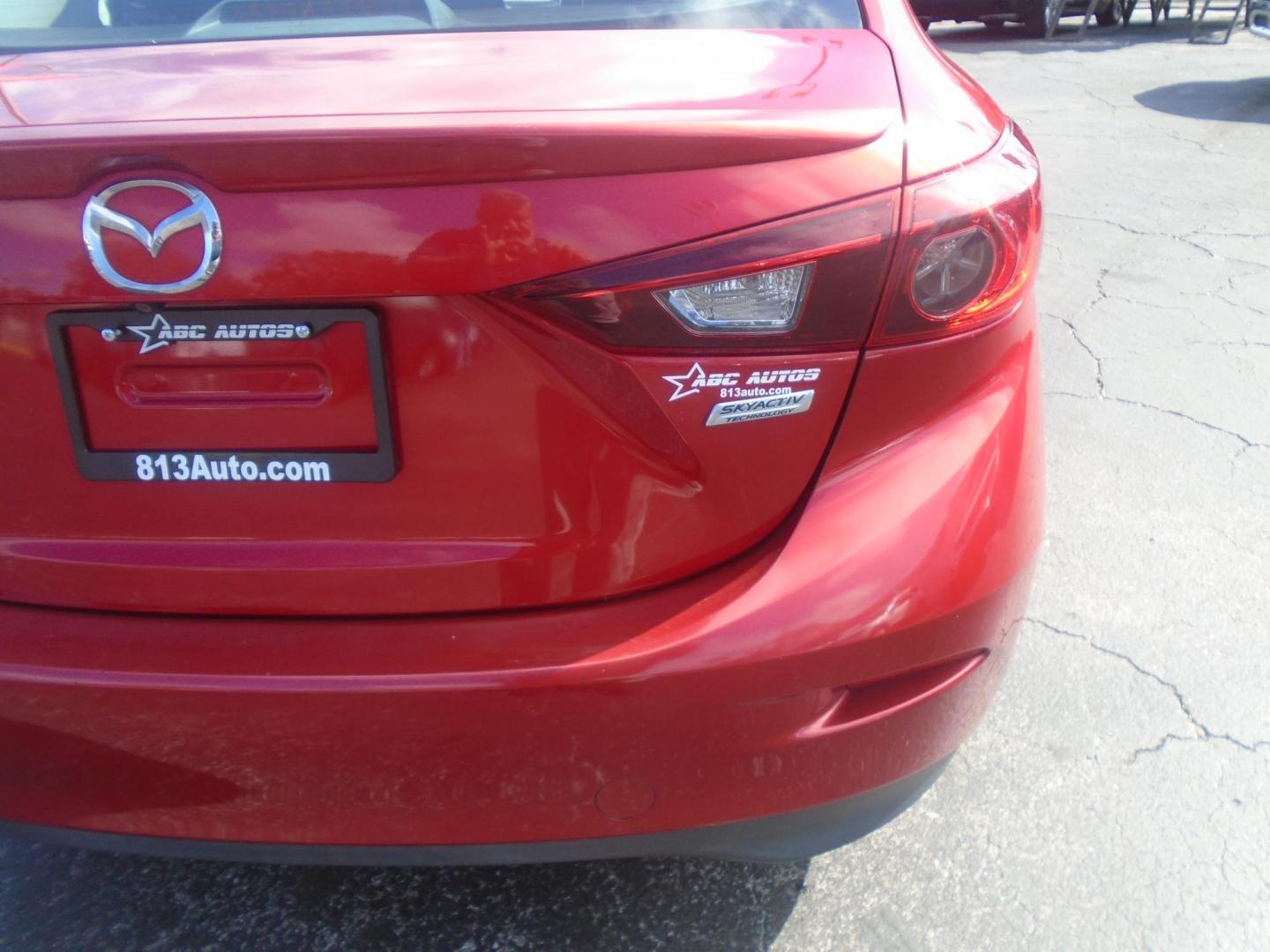 2015 Mazda MAZDA3 i Touring AT 4-Door (3MZBM1V74FM) with an 2.0L L4 DOHC 16V engine, 6-Speed Automatic transmission, located at 6112 N Florida Avenue, Tampa, FL, 33604, (888) 521-5131, 27.954929, -82.459534 - Photo#9