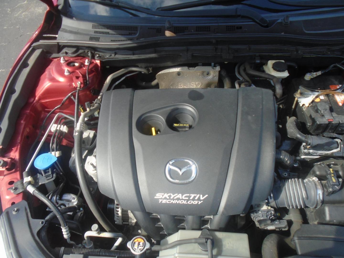 2015 Mazda MAZDA3 i Touring AT 4-Door (3MZBM1V74FM) with an 2.0L L4 DOHC 16V engine, 6-Speed Automatic transmission, located at 6112 N Florida Avenue, Tampa, FL, 33604, (888) 521-5131, 27.954929, -82.459534 - Photo#13