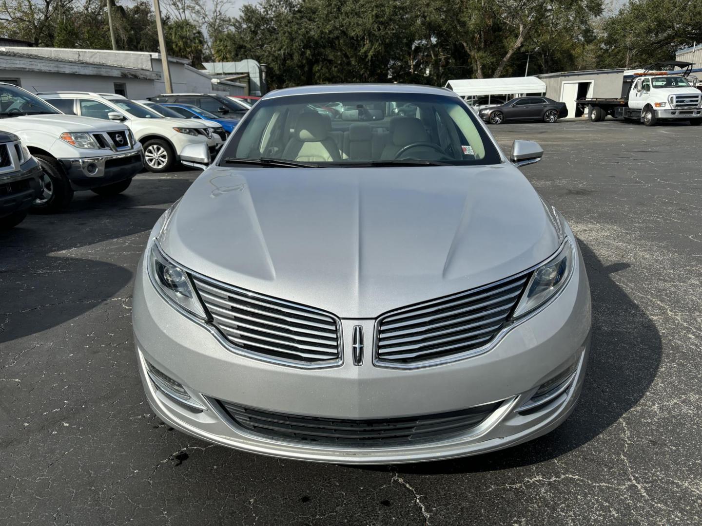 2016 Lincoln MKZ FWD (3LN6L2G99GR) with an 2.0L L4 DOHC 16V engine, 6A transmission, located at 6112 N Florida Avenue, Tampa, FL, 33604, (888) 521-5131, 27.954929, -82.459534 - Photo#1