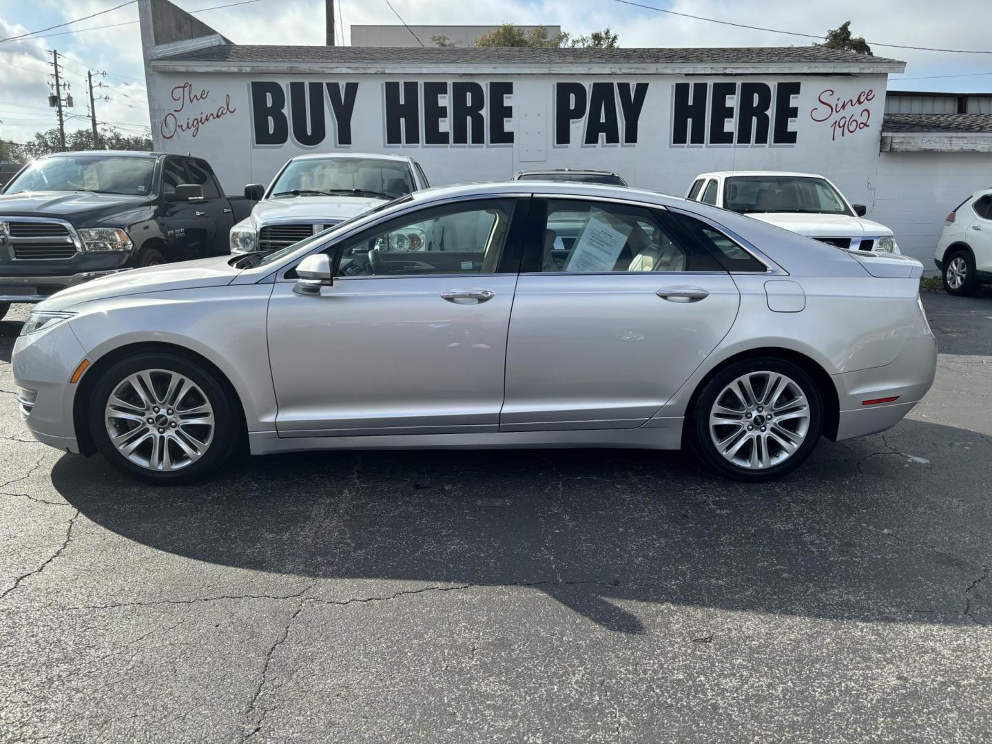 2016 Lincoln MKZ FWD (3LN6L2G99GR) with an 2.0L L4 DOHC 16V engine, 6A transmission, located at 6112 N Florida Avenue, Tampa, FL, 33604, (888) 521-5131, 27.954929, -82.459534 - Photo#0