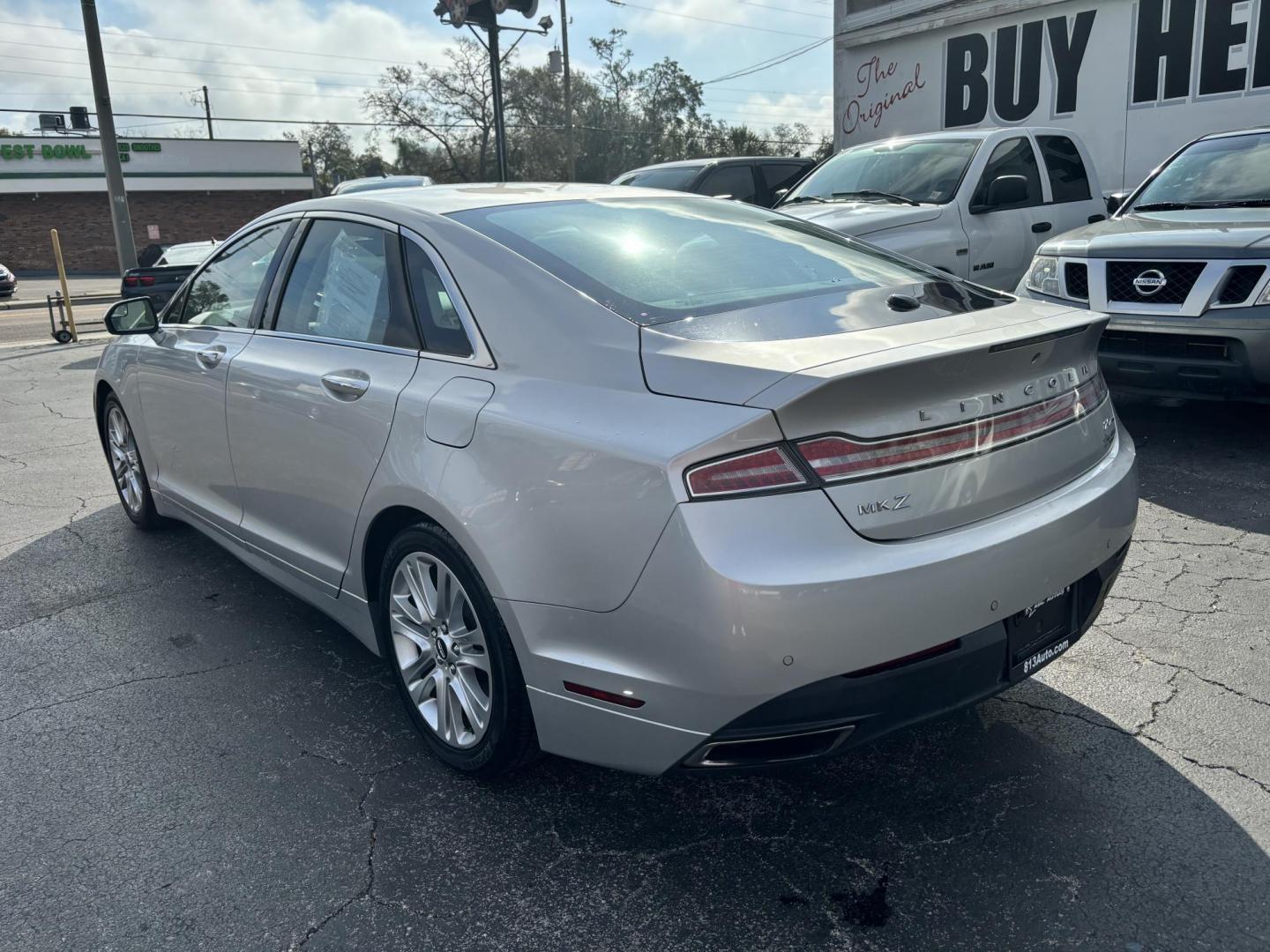 2016 Lincoln MKZ FWD (3LN6L2G99GR) with an 2.0L L4 DOHC 16V engine, 6A transmission, located at 6112 N Florida Avenue, Tampa, FL, 33604, (888) 521-5131, 27.954929, -82.459534 - Photo#3