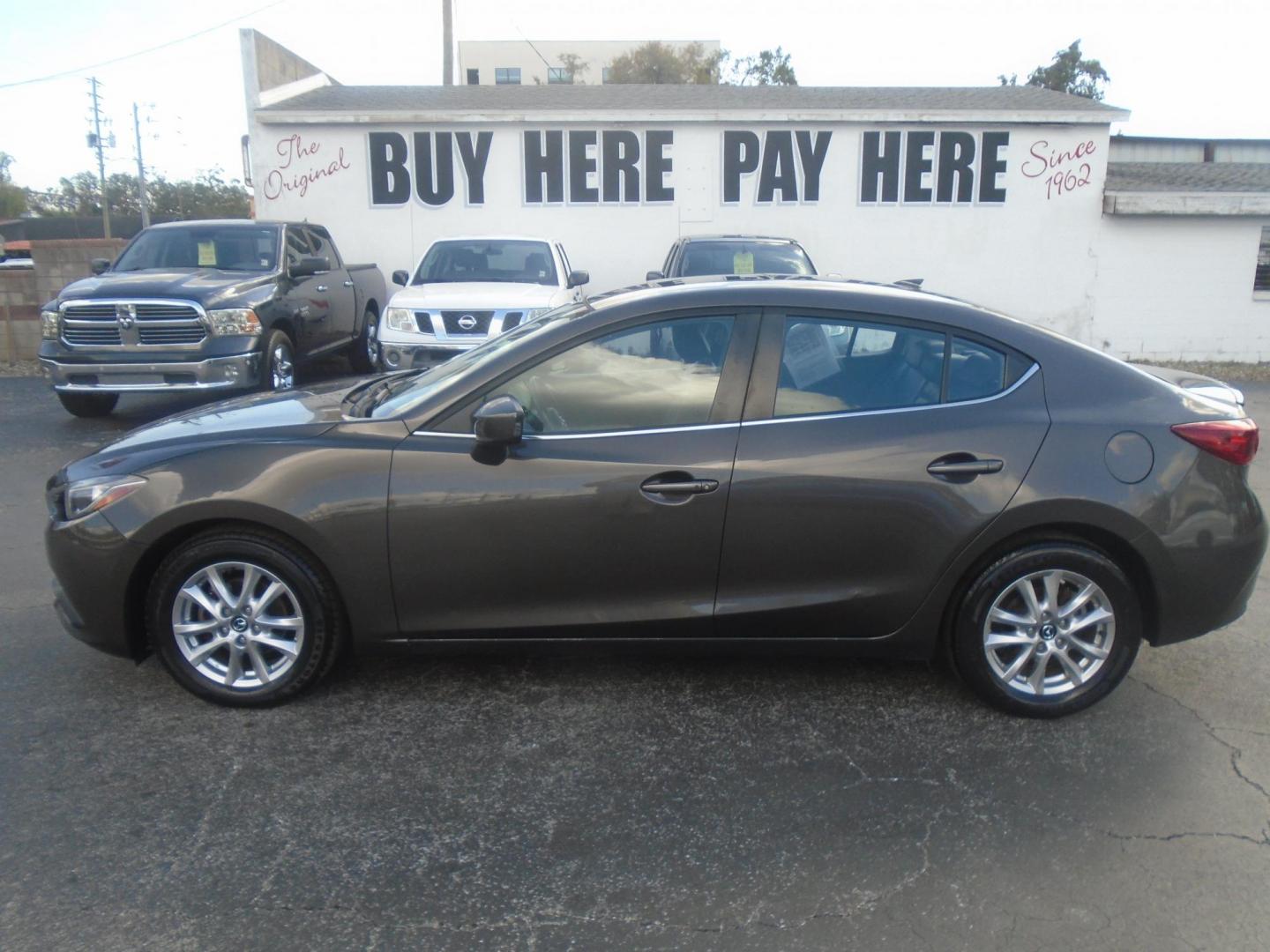 2014 Mazda MAZDA3 i Grand Touring AT 4-Door (JM1BM1W75E1) with an 2.0L L4 DOHC 16V engine, 6-Speed Automatic transmission, located at 6112 N Florida Avenue, Tampa, FL, 33604, (888) 521-5131, 27.954929, -82.459534 - Photo#0