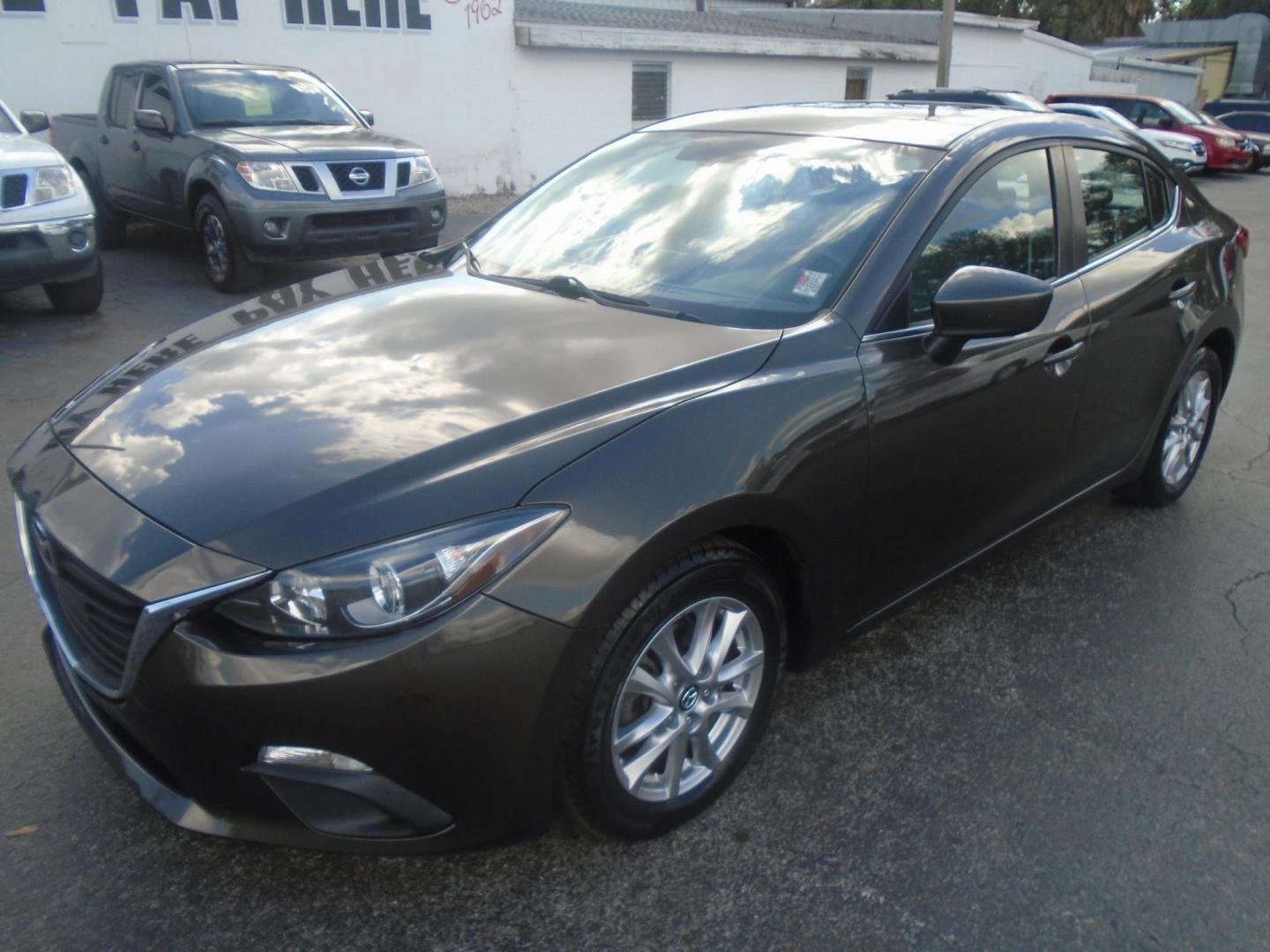 2014 Mazda MAZDA3 i Grand Touring AT 4-Door (JM1BM1W75E1) with an 2.0L L4 DOHC 16V engine, 6-Speed Automatic transmission, located at 6112 N Florida Avenue, Tampa, FL, 33604, (888) 521-5131, 27.954929, -82.459534 - Photo#2