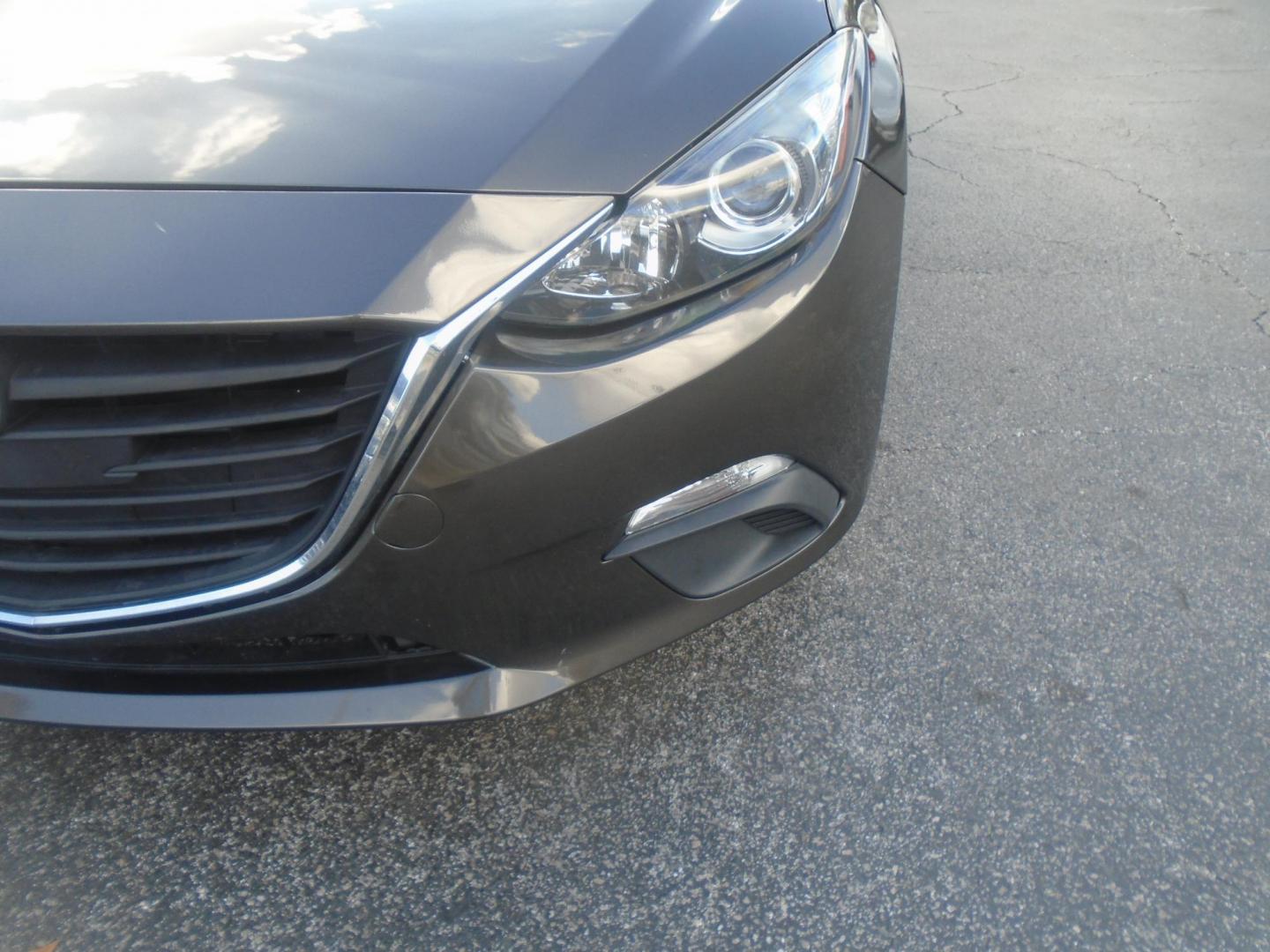 2014 Mazda MAZDA3 i Grand Touring AT 4-Door (JM1BM1W75E1) with an 2.0L L4 DOHC 16V engine, 6-Speed Automatic transmission, located at 6112 N Florida Avenue, Tampa, FL, 33604, (888) 521-5131, 27.954929, -82.459534 - Photo#9