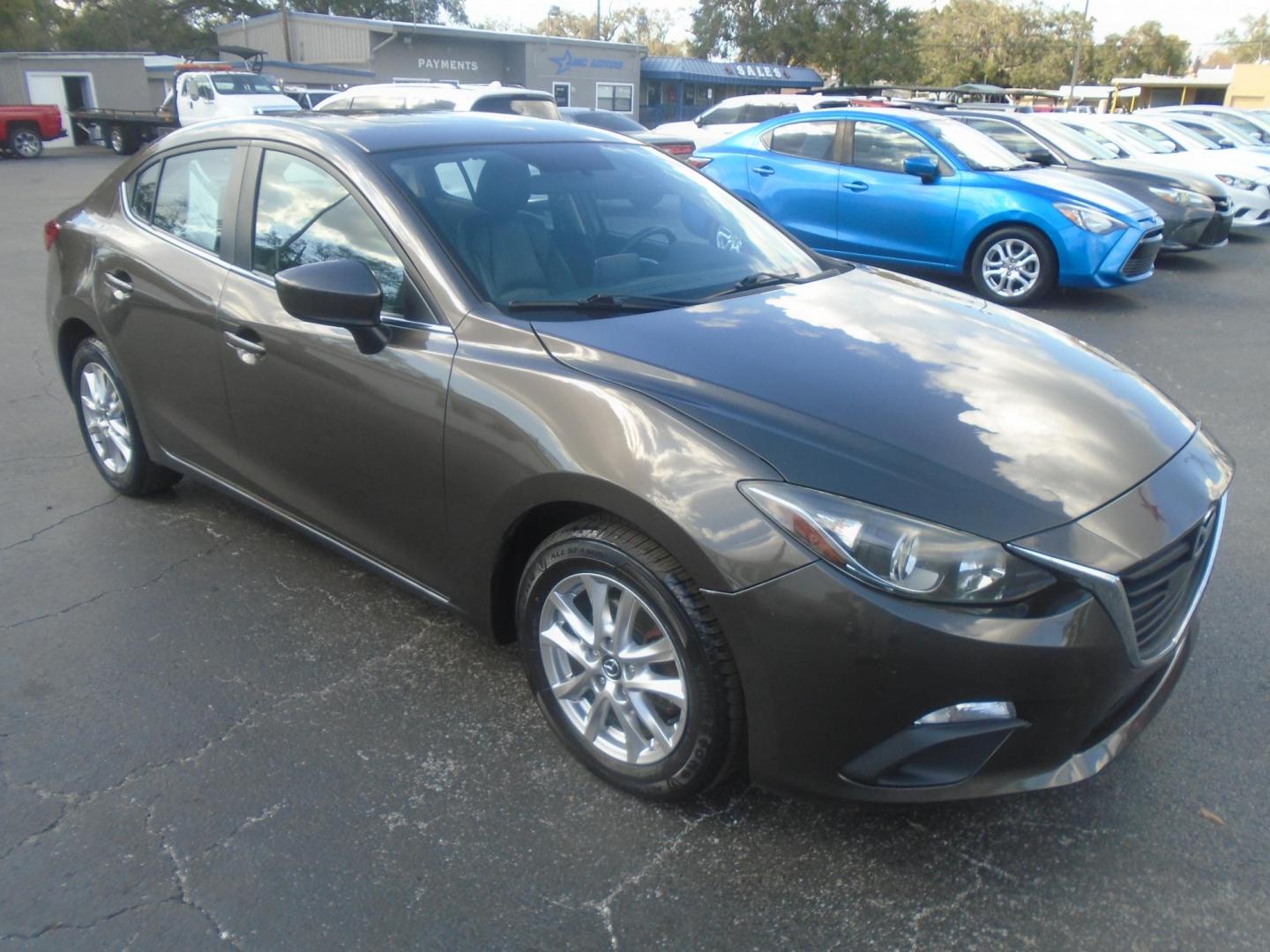 2014 Mazda MAZDA3 i Grand Touring AT 4-Door (JM1BM1W75E1) with an 2.0L L4 DOHC 16V engine, 6-Speed Automatic transmission, located at 6112 N Florida Avenue, Tampa, FL, 33604, (888) 521-5131, 27.954929, -82.459534 - Photo#3