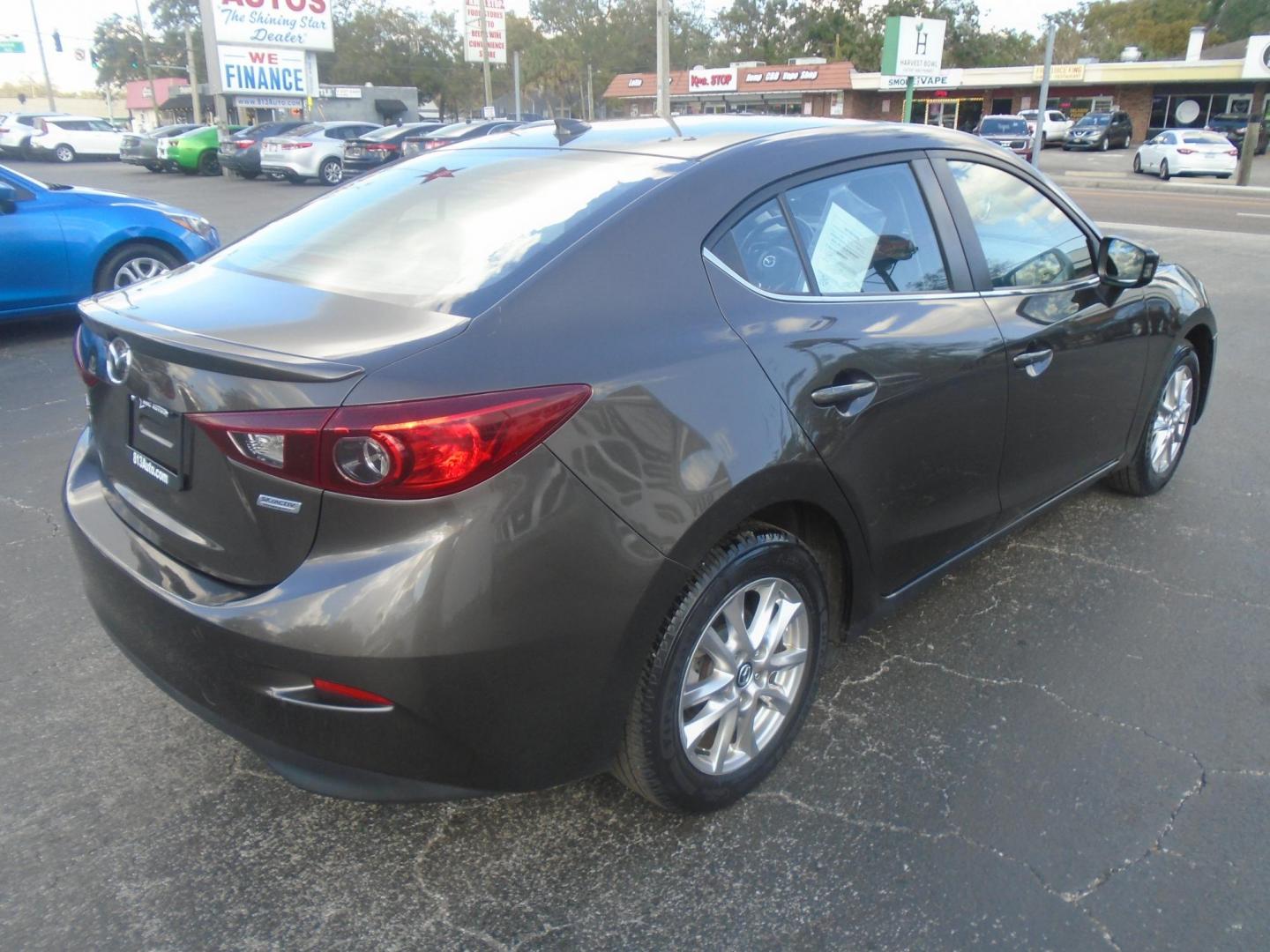 2014 Mazda MAZDA3 i Grand Touring AT 4-Door (JM1BM1W75E1) with an 2.0L L4 DOHC 16V engine, 6-Speed Automatic transmission, located at 6112 N Florida Avenue, Tampa, FL, 33604, (888) 521-5131, 27.954929, -82.459534 - Photo#6