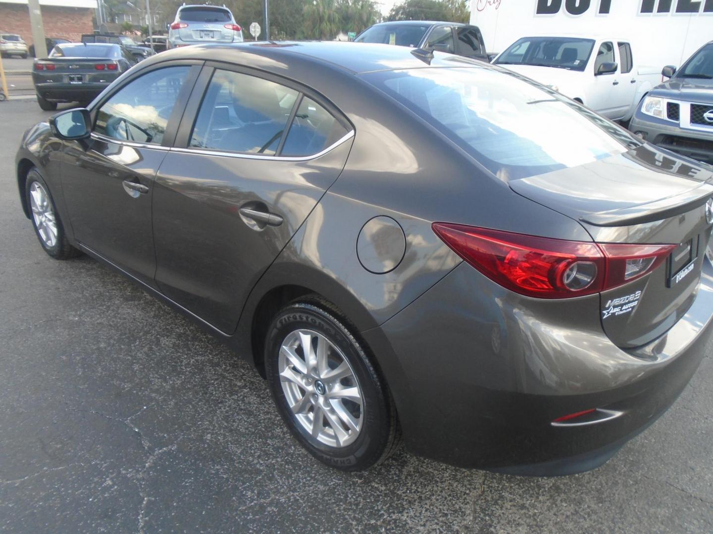 2014 Mazda MAZDA3 i Grand Touring AT 4-Door (JM1BM1W75E1) with an 2.0L L4 DOHC 16V engine, 6-Speed Automatic transmission, located at 6112 N Florida Avenue, Tampa, FL, 33604, (888) 521-5131, 27.954929, -82.459534 - Photo#4