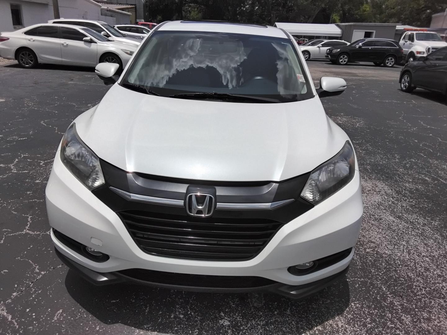 2016 White /Beige Honda HR-V EX 2WD CVT (3CZRU5H53GM) with an 1.8L L4 DOHC 16V engine, Continuously Variable Transmission transmission, located at 6112 N Florida Avenue, Tampa, FL, 33604, (888) 521-5131, 27.954929, -82.459534 - $499 down plus tax & tag.- Photo#2