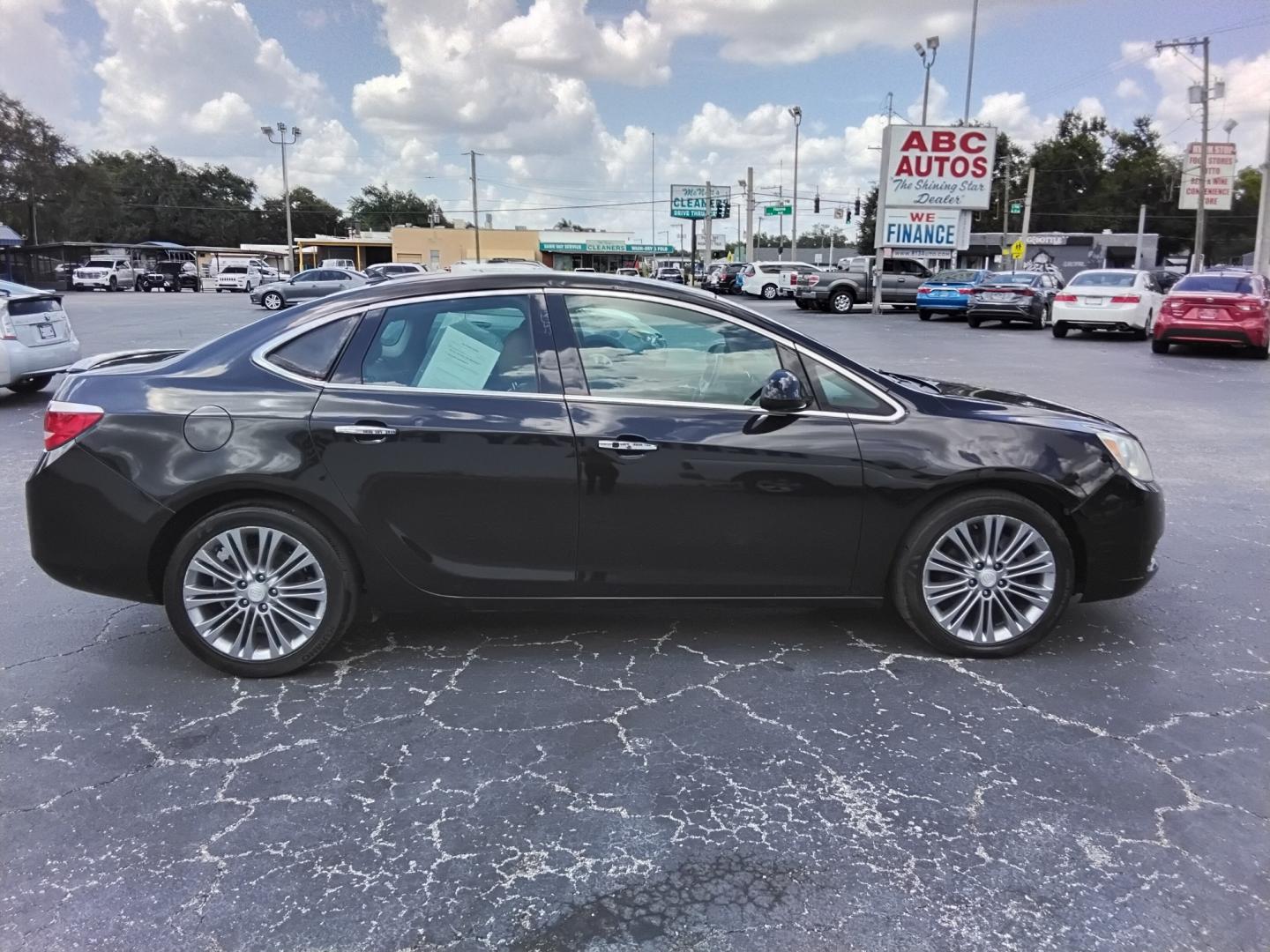 2012 BLACK /Brown Buick Verano Leather (1G4PS5SK2C4) with an 2.4L L4 DOHC 16V FFV engine, 6-Speed Automatic transmission, located at 6112 N Florida Avenue, Tampa, FL, 33604, (888) 521-5131, 27.954929, -82.459534 - 499$ down plus tax & tag.- Photo#2