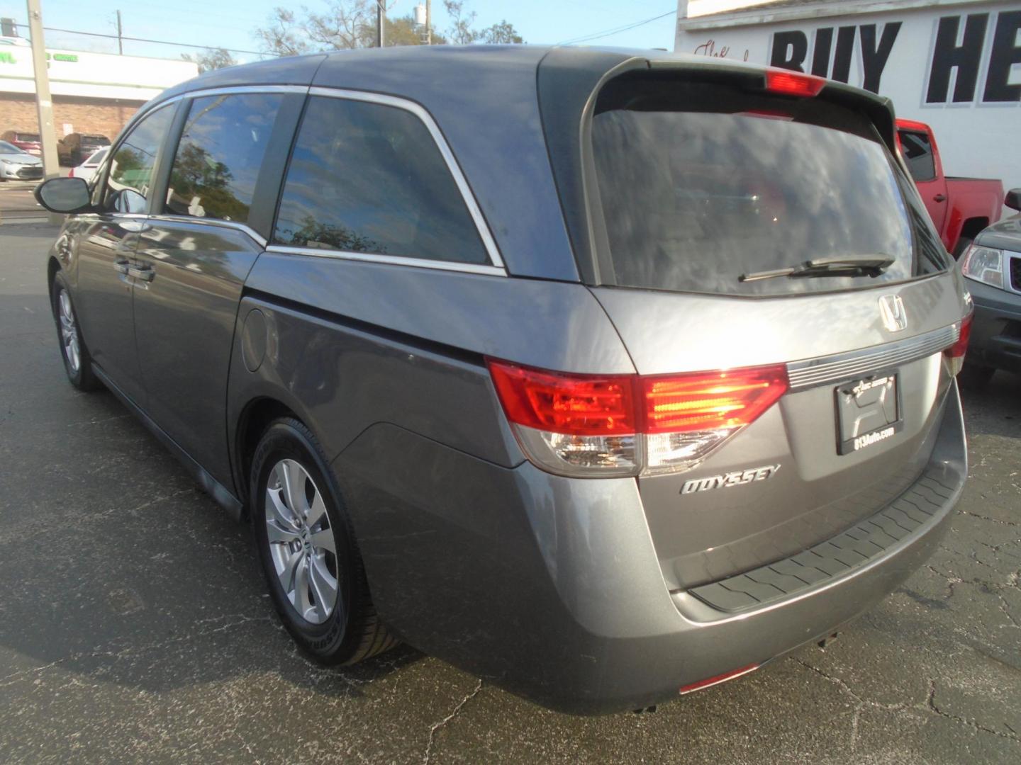 2014 Honda Odyssey EX-L (5FNRL5H62EB) with an 3.5L V6 SOHC 24V engine, 6-Speed Automatic transmission, located at 6112 N Florida Avenue, Tampa, FL, 33604, (888) 521-5131, 27.954929, -82.459534 - Photo#4