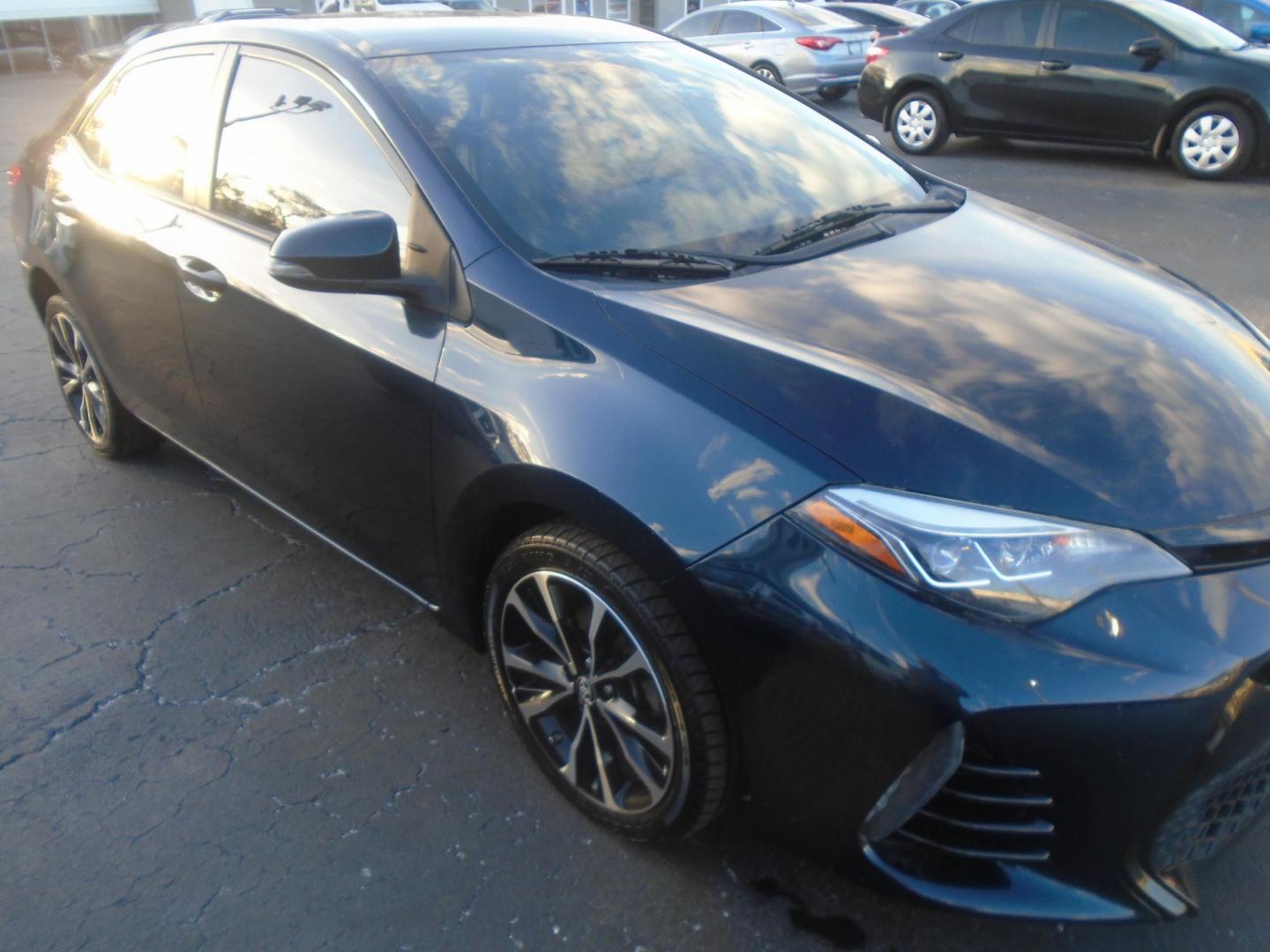 2018 Toyota Corolla SE 6M (5YFBURHE7JP) with an 1.8L L4 DOHC 16V engine, 6M transmission, located at 6112 N Florida Avenue, Tampa, FL, 33604, (888) 521-5131, 27.954929, -82.459534 - Photo#0