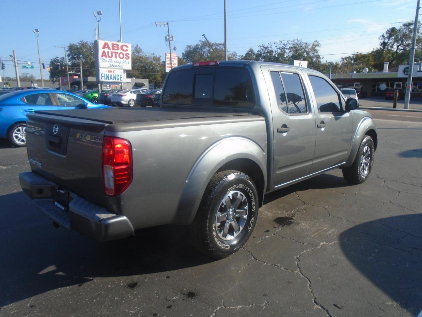 2016 Nissan Frontier S Crew Cab 5AT 2WD (1N6AD0ER0GN) with an 4.0L V6 DOHC 24V engine, 5A transmission, located at 6112 N Florida Avenue, Tampa, FL, 33604, (888) 521-5131, 27.954929, -82.459534 - Photo#4