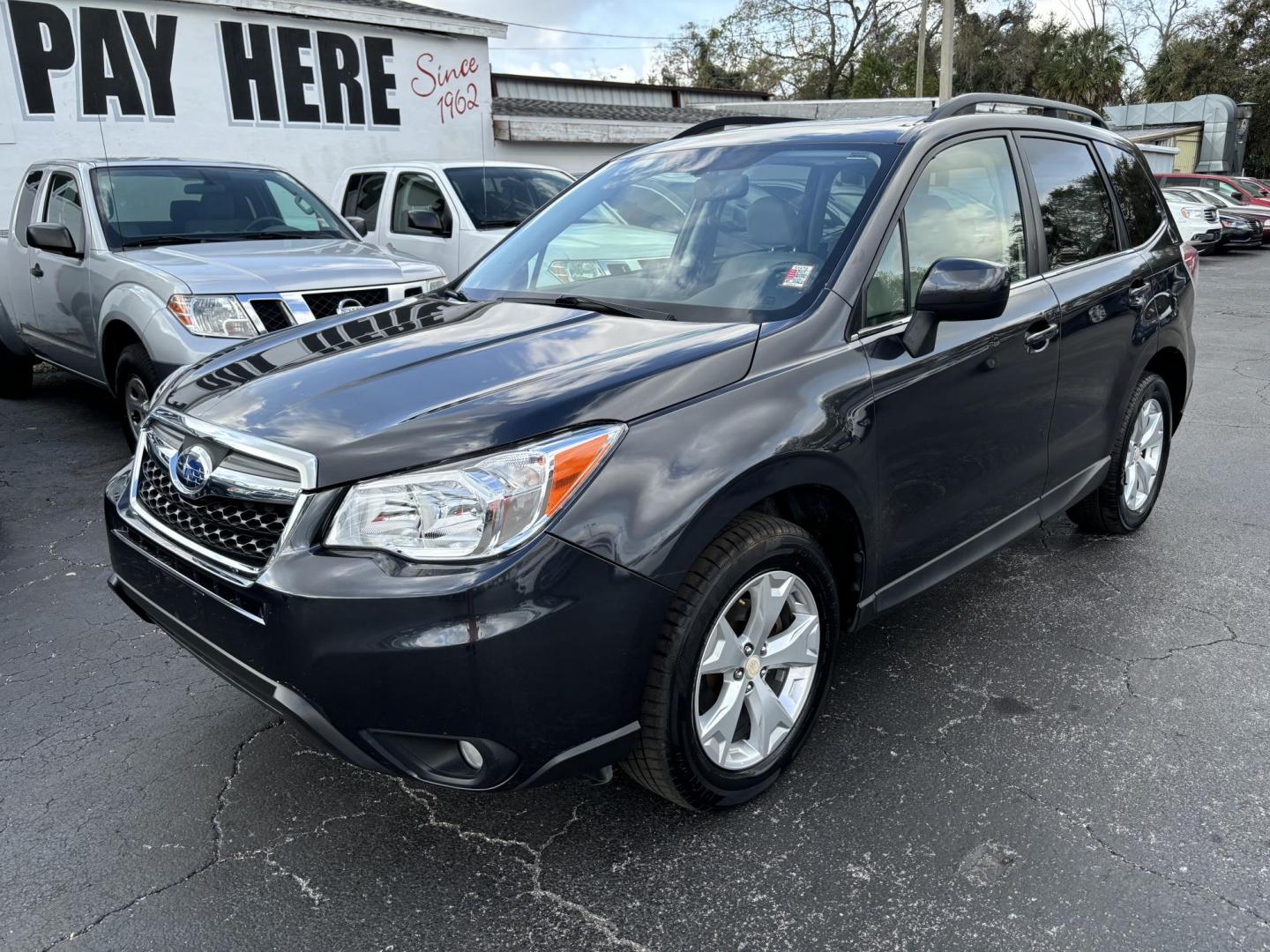 2015 Subaru Forester 2.5i Limited (JF2SJAHC5FH) with an 2.5L H4 SOHC 16V engine, 6-Speed Automatic transmission, located at 6112 N Florida Avenue, Tampa, FL, 33604, (888) 521-5131, 27.954929, -82.459534 - Photo#2