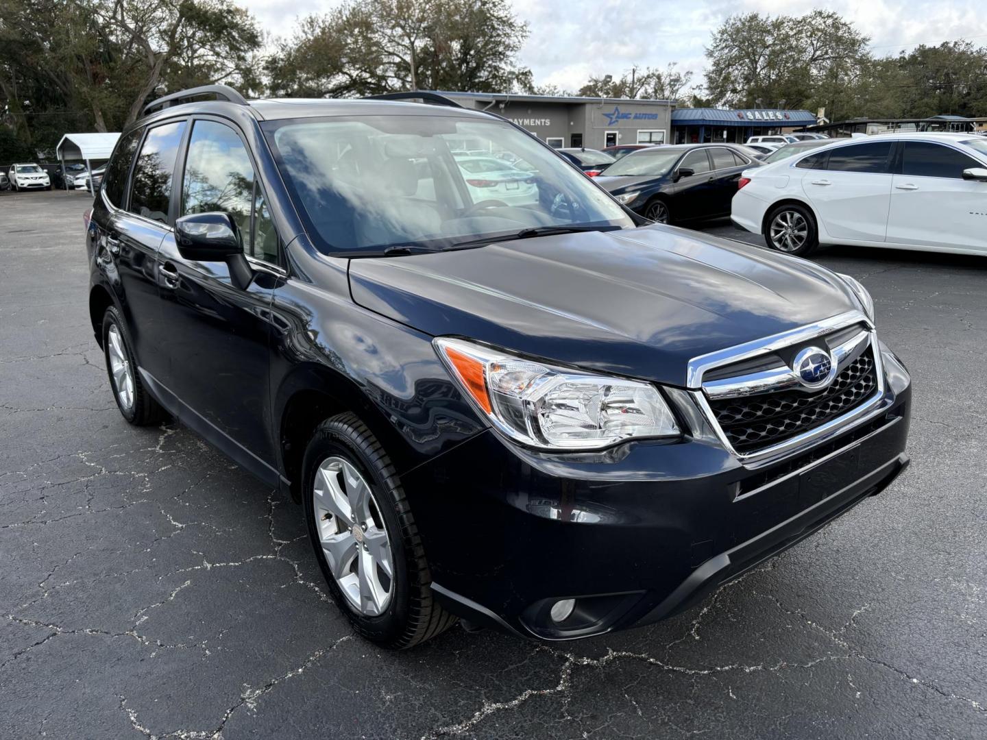 2015 Subaru Forester 2.5i Limited (JF2SJAHC5FH) with an 2.5L H4 SOHC 16V engine, 6-Speed Automatic transmission, located at 6112 N Florida Avenue, Tampa, FL, 33604, (888) 521-5131, 27.954929, -82.459534 - Photo#3