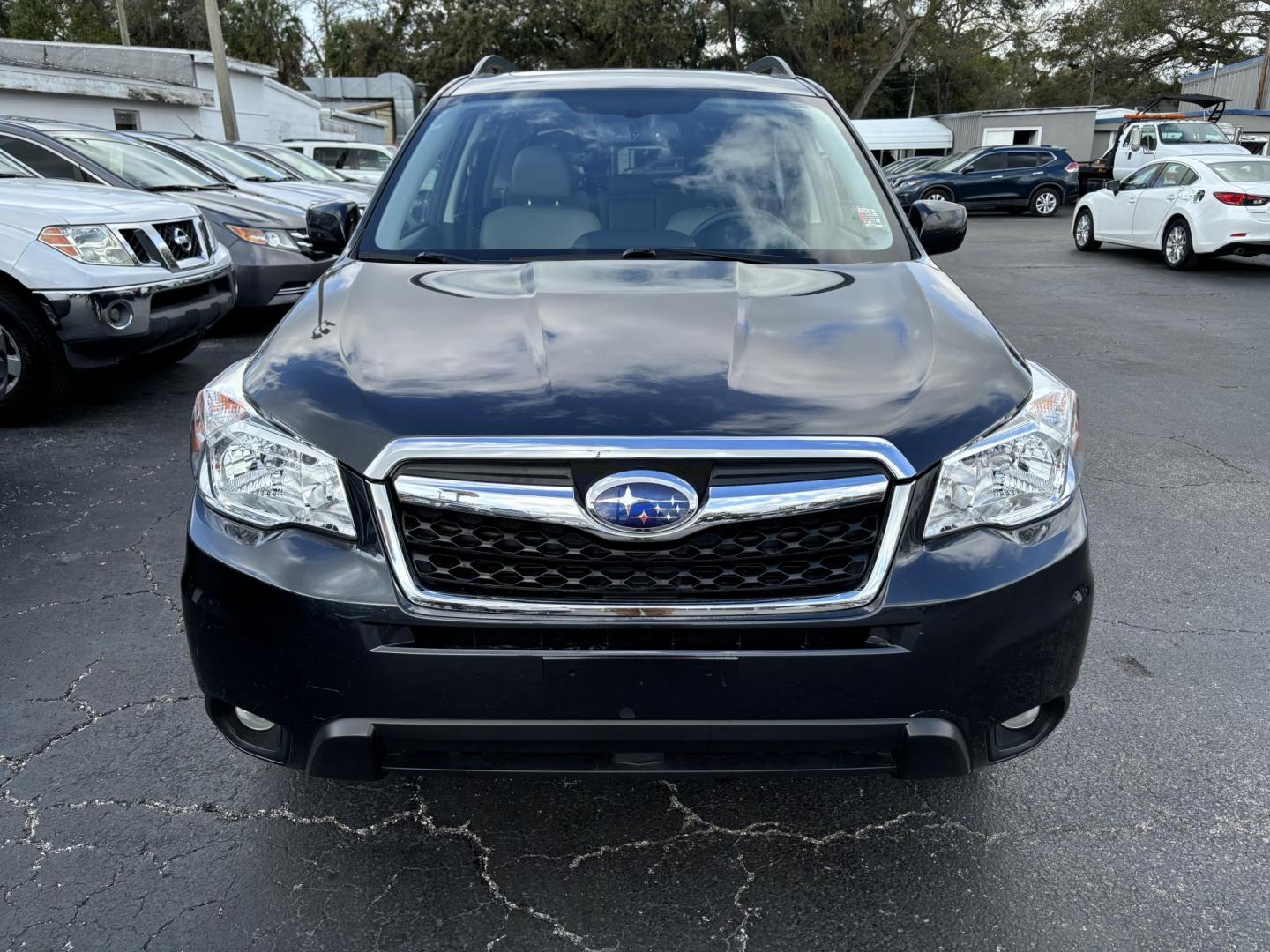 2015 Subaru Forester 2.5i Limited (JF2SJAHC5FH) with an 2.5L H4 SOHC 16V engine, 6-Speed Automatic transmission, located at 6112 N Florida Avenue, Tampa, FL, 33604, (888) 521-5131, 27.954929, -82.459534 - Photo#1