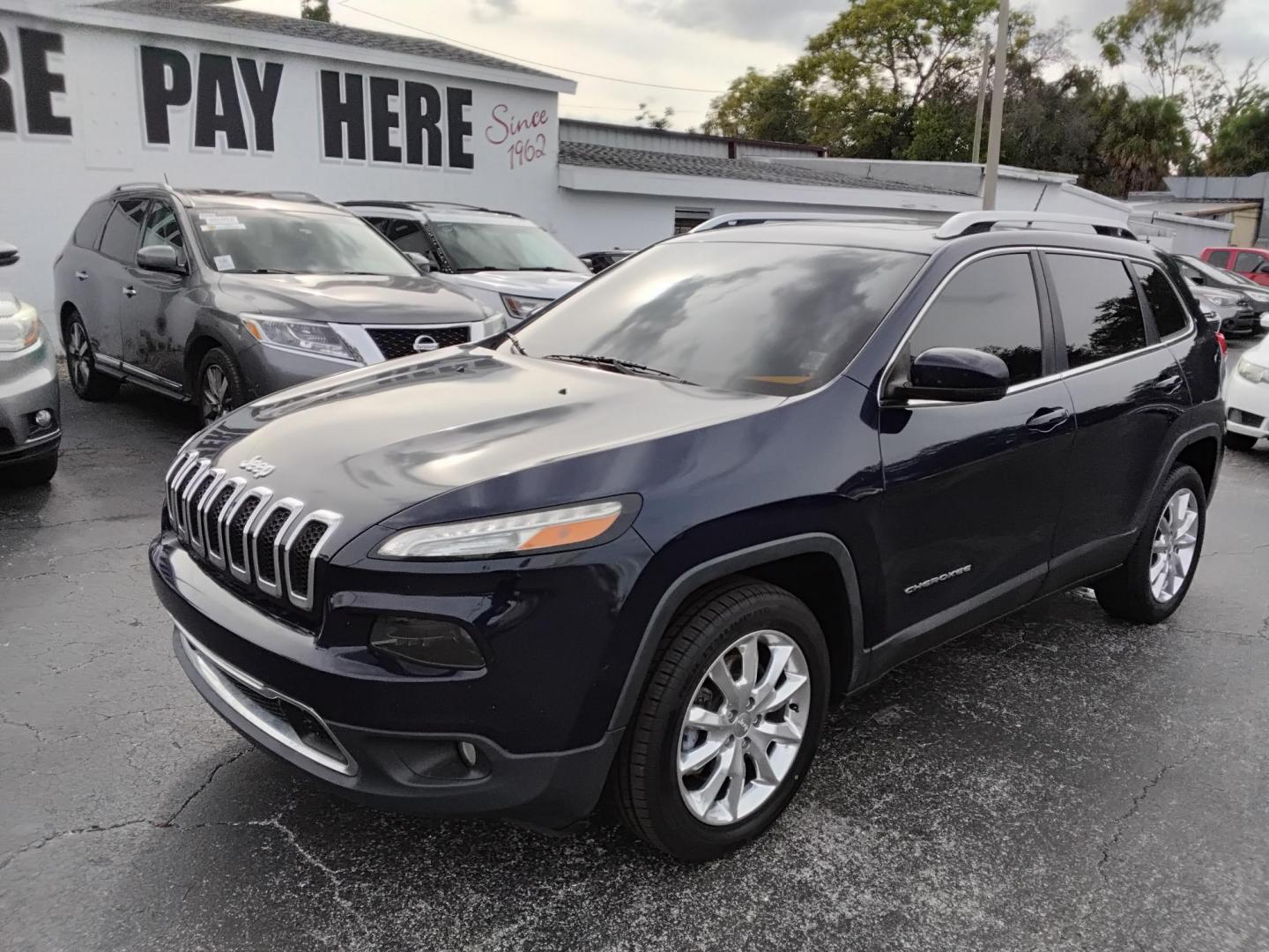 2015 DK BLUE /Black Jeep Cherokee Limited FWD (1C4PJLDS9FW) with an 3.2L V6 DOHC 24V engine, 9-Speed Automatic transmission, located at 6112 N Florida Avenue, Tampa, FL, 33604, (888) 521-5131, 27.954929, -82.459534 - $499 DOWN PLUS TAX & TAG. - Photo#1