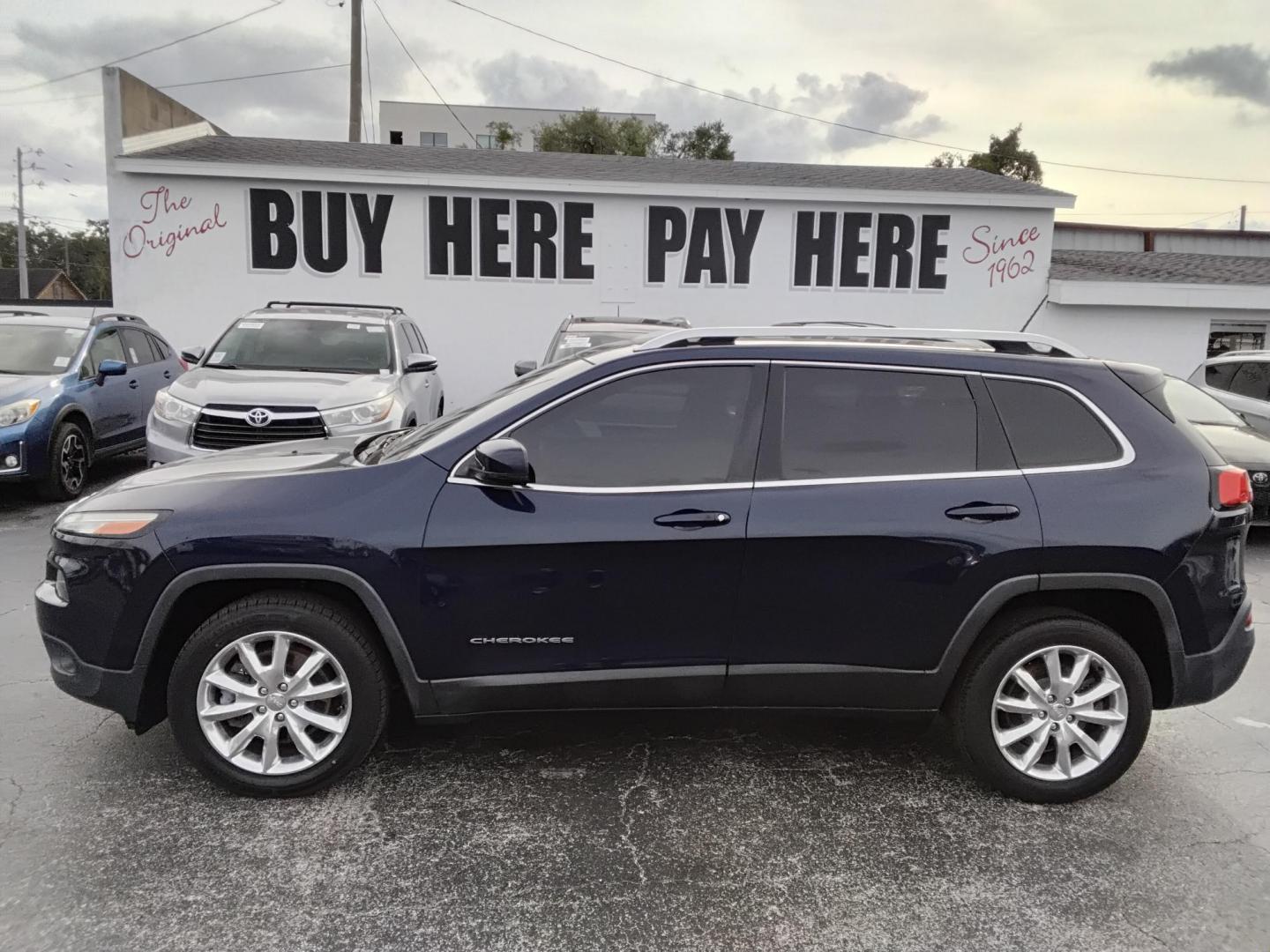 2015 DK BLUE /Black Jeep Cherokee Limited FWD (1C4PJLDS9FW) with an 3.2L V6 DOHC 24V engine, 9-Speed Automatic transmission, located at 6112 N Florida Avenue, Tampa, FL, 33604, (888) 521-5131, 27.954929, -82.459534 - $499 DOWN PLUS TAX & TAG. - Photo#0