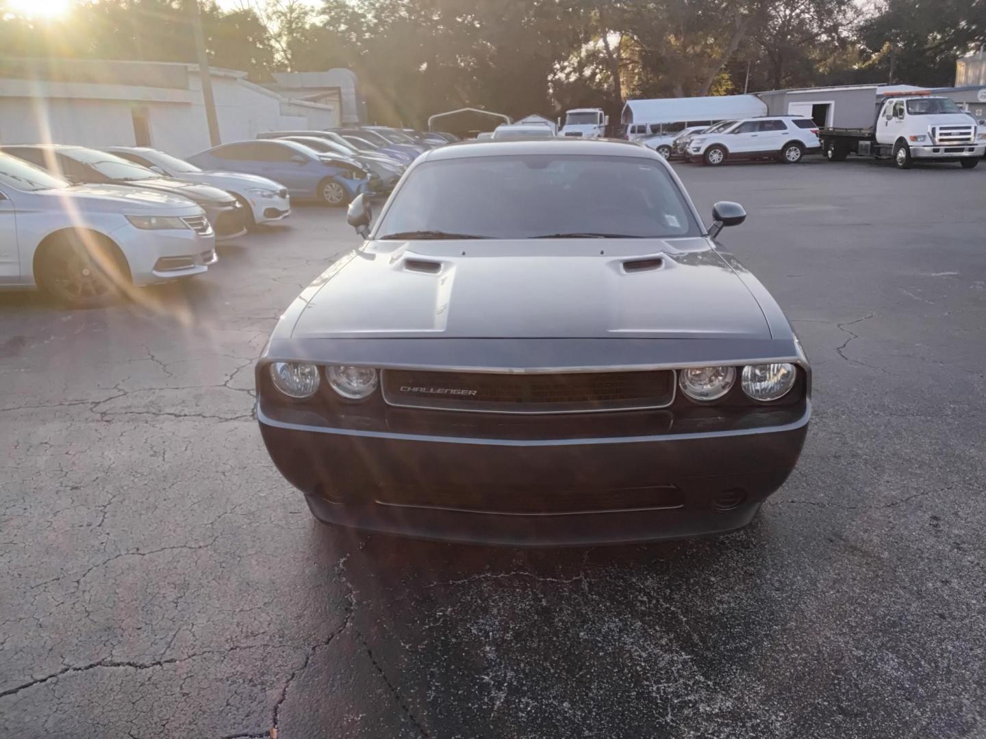 2012 GRAY /Grey Dodge Challenger SXT (2C3CDYAG7CH) with an 3.6L V6 DOHC 24V engine, 4-Speed Automatic transmission, located at 6112 N Florida Avenue, Tampa, FL, 33604, (888) 521-5131, 27.954929, -82.459534 - $499 down plus tax & tag. - Photo#1