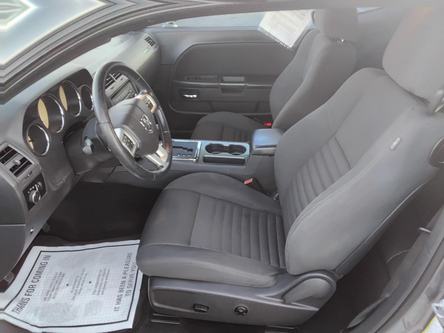 2012 GRAY /Grey Dodge Challenger SXT (2C3CDYAG7CH) with an 3.6L V6 DOHC 24V engine, 4-Speed Automatic transmission, located at 6112 N Florida Avenue, Tampa, FL, 33604, (888) 521-5131, 27.954929, -82.459534 - $499 down plus tax & tag. - Photo#9