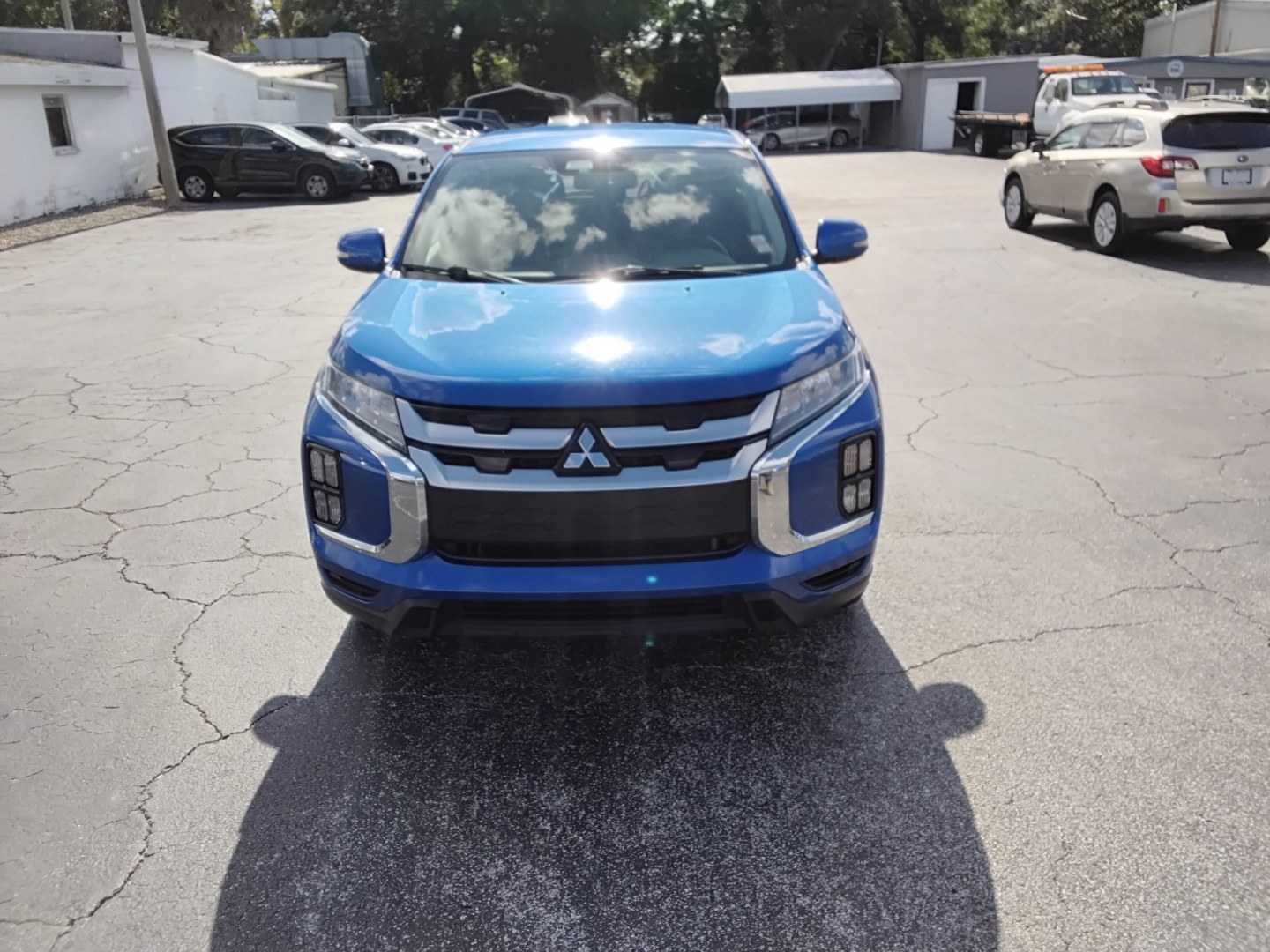 2020 BLUE /GREY Mitsubishi Outlander Sport 2.0 ES CVT (JA4AP4AU0LU) with an 2.0L L4 DOHC 16V engine, CVT transmission, located at 6112 N Florida Avenue, Tampa, FL, 33604, (888) 521-5131, 27.954929, -82.459534 - $499 DOWN PLUS TAX & TAG.- Photo#1