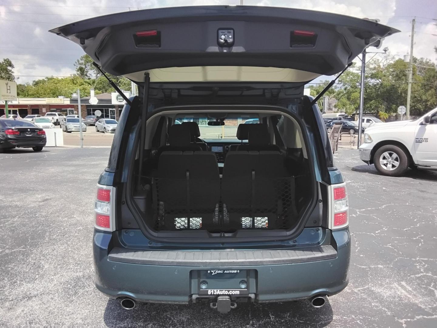 2016 BLUE /Grey Ford Flex Limited AWD w/EcoBoost (2FMHK6DT8GB) with an 3.5L V6 DOHC 24V engine, 6A transmission, located at 6112 N Florida Avenue, Tampa, FL, 33604, (888) 521-5131, 27.954929, -82.459534 - $499 DOWN PLUS TAX & TAG. - Photo#7