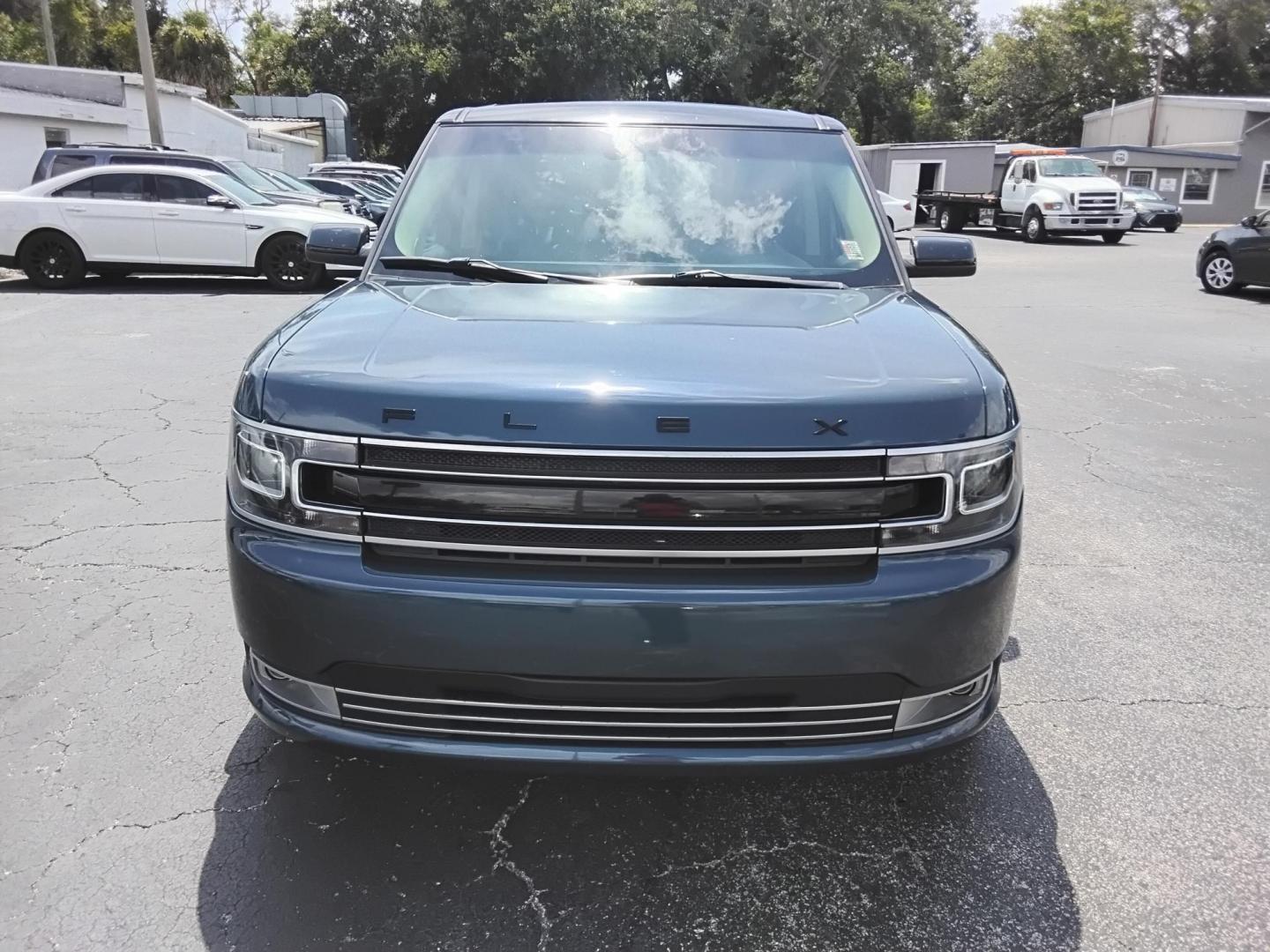 2016 BLUE /Grey Ford Flex Limited AWD w/EcoBoost (2FMHK6DT8GB) with an 3.5L V6 DOHC 24V engine, 6A transmission, located at 6112 N Florida Avenue, Tampa, FL, 33604, (888) 521-5131, 27.954929, -82.459534 - $499 DOWN PLUS TAX & TAG. - Photo#2
