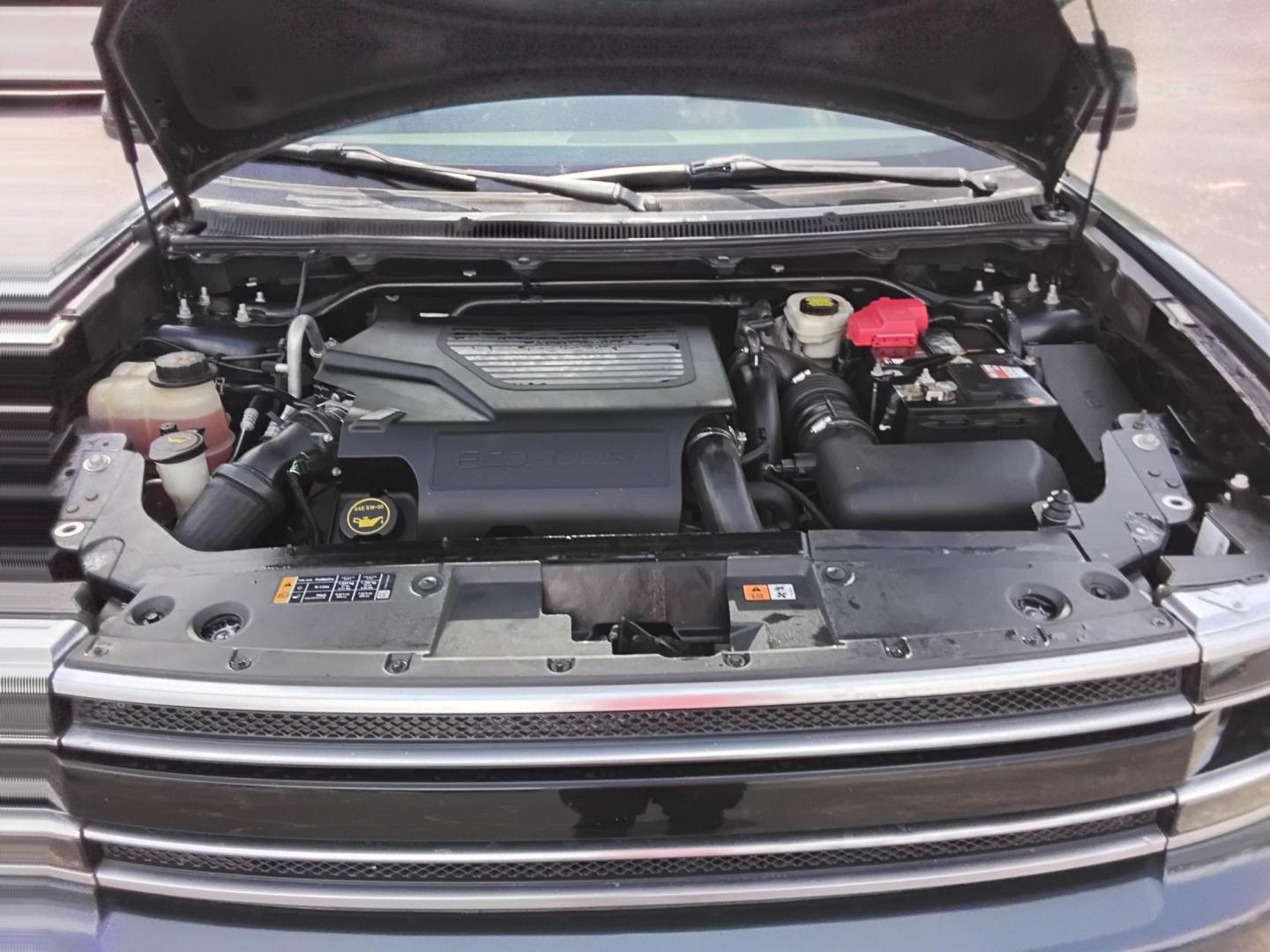 2016 BLUE /Grey Ford Flex Limited AWD w/EcoBoost (2FMHK6DT8GB) with an 3.5L V6 DOHC 24V engine, 6A transmission, located at 6112 N Florida Avenue, Tampa, FL, 33604, (888) 521-5131, 27.954929, -82.459534 - $499 DOWN PLUS TAX & TAG. - Photo#13