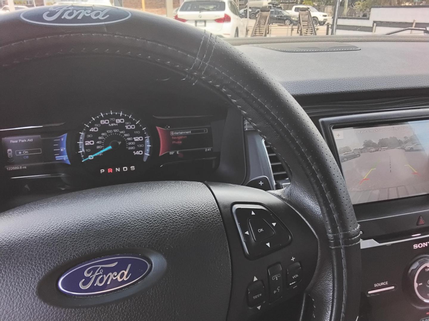 2016 BLUE /Grey Ford Flex Limited AWD w/EcoBoost (2FMHK6DT8GB) with an 3.5L V6 DOHC 24V engine, 6A transmission, located at 6112 N Florida Avenue, Tampa, FL, 33604, (888) 521-5131, 27.954929, -82.459534 - $499 DOWN PLUS TAX & TAG. - Photo#8