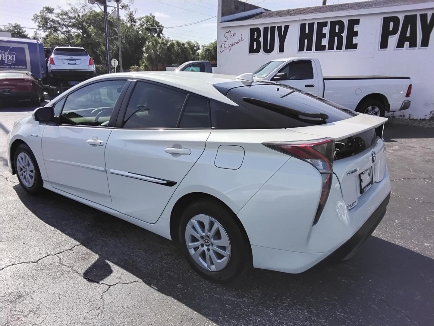 2016 White /Beige Toyota Prius Two (JTDKBRFU1G3) with an 1.8L L4 DOHC 16V HYBRID engine, CVT transmission, located at 6112 N Florida Avenue, Tampa, FL, 33604, (888) 521-5131, 27.954929, -82.459534 - $499 down plus tax & tag. - Photo#7