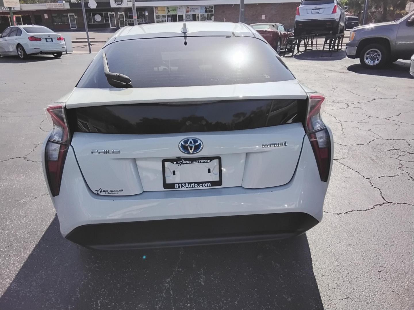 2016 White /Beige Toyota Prius Two (JTDKBRFU1G3) with an 1.8L L4 DOHC 16V HYBRID engine, CVT transmission, located at 6112 N Florida Avenue, Tampa, FL, 33604, (888) 521-5131, 27.954929, -82.459534 - $499 down plus tax & tag. - Photo#14