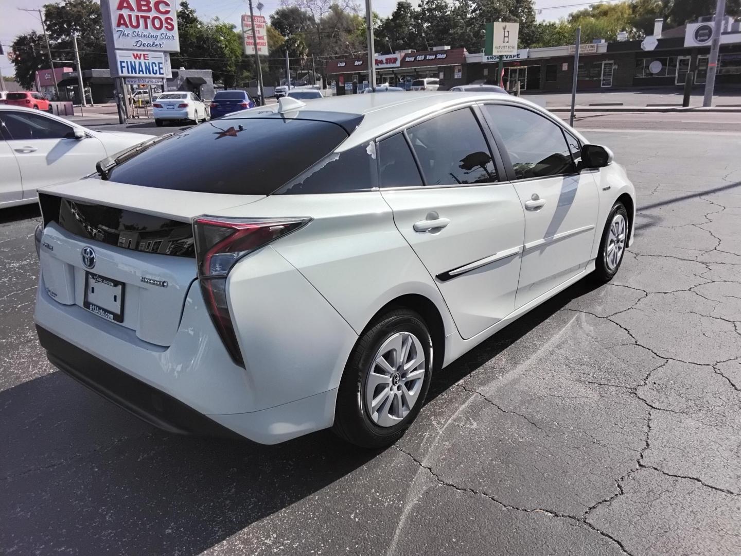 2016 White /Beige Toyota Prius Two (JTDKBRFU1G3) with an 1.8L L4 DOHC 16V HYBRID engine, CVT transmission, located at 6112 N Florida Avenue, Tampa, FL, 33604, (888) 521-5131, 27.954929, -82.459534 - $499 down plus tax & tag. - Photo#12
