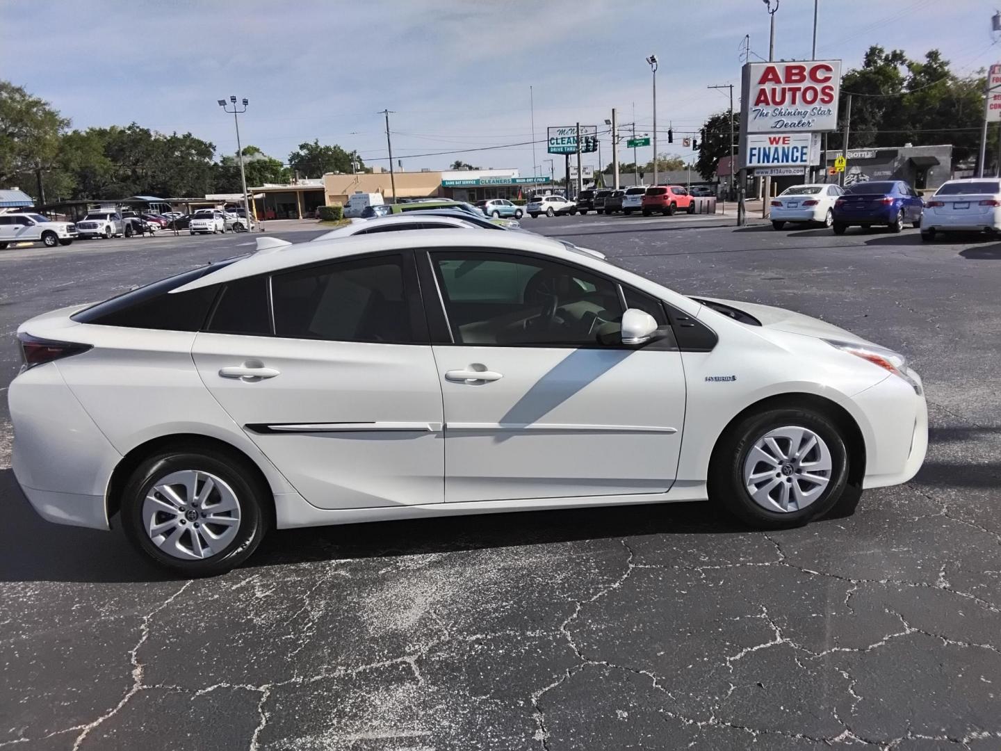 2016 White /Beige Toyota Prius Two (JTDKBRFU1G3) with an 1.8L L4 DOHC 16V HYBRID engine, CVT transmission, located at 6112 N Florida Avenue, Tampa, FL, 33604, (888) 521-5131, 27.954929, -82.459534 - $499 down plus tax & tag. - Photo#13