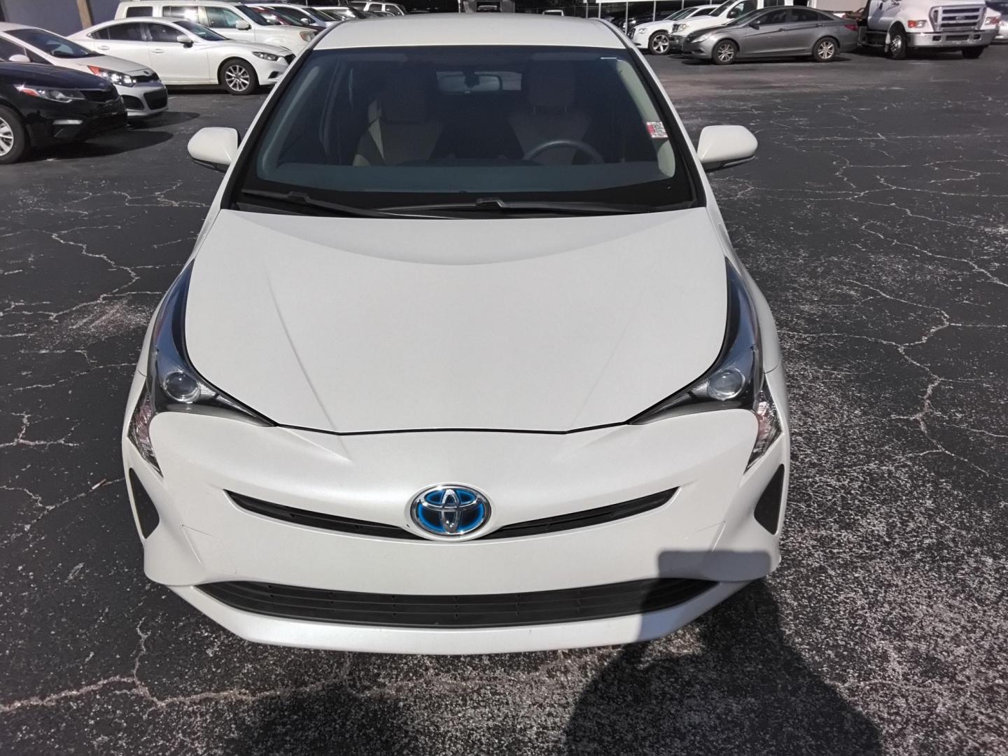 2016 White /Beige Toyota Prius Two (JTDKBRFU1G3) with an 1.8L L4 DOHC 16V HYBRID engine, CVT transmission, located at 6112 N Florida Avenue, Tampa, FL, 33604, (888) 521-5131, 27.954929, -82.459534 - $499 down plus tax & tag. - Photo#2