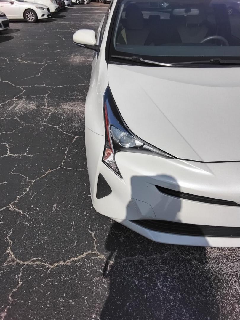 2016 White /Beige Toyota Prius Two (JTDKBRFU1G3) with an 1.8L L4 DOHC 16V HYBRID engine, CVT transmission, located at 6112 N Florida Avenue, Tampa, FL, 33604, (888) 521-5131, 27.954929, -82.459534 - $499 down plus tax & tag. - Photo#4