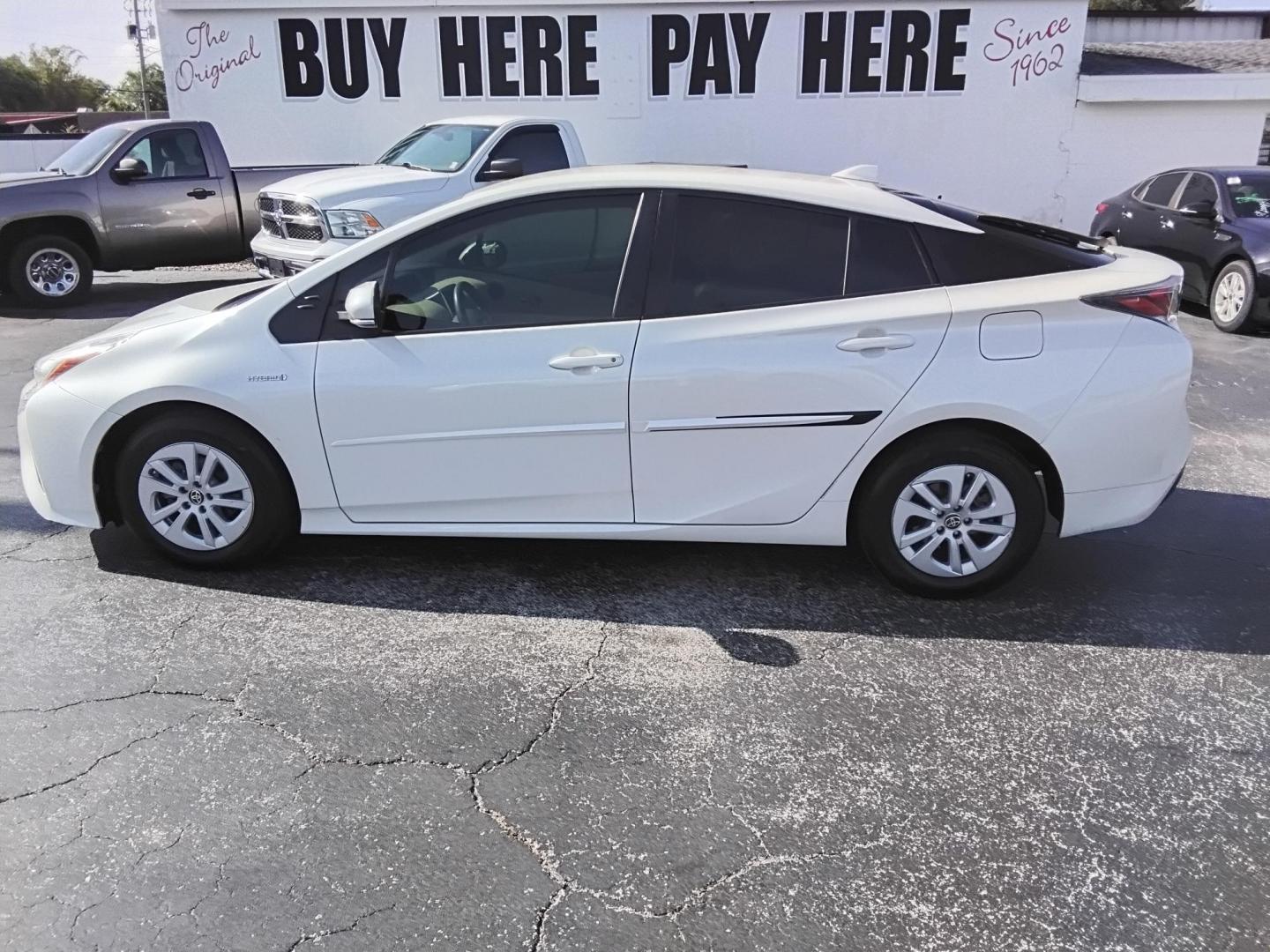 2016 White /Beige Toyota Prius Two (JTDKBRFU1G3) with an 1.8L L4 DOHC 16V HYBRID engine, CVT transmission, located at 6112 N Florida Avenue, Tampa, FL, 33604, (888) 521-5131, 27.954929, -82.459534 - $499 down plus tax & tag. - Photo#0